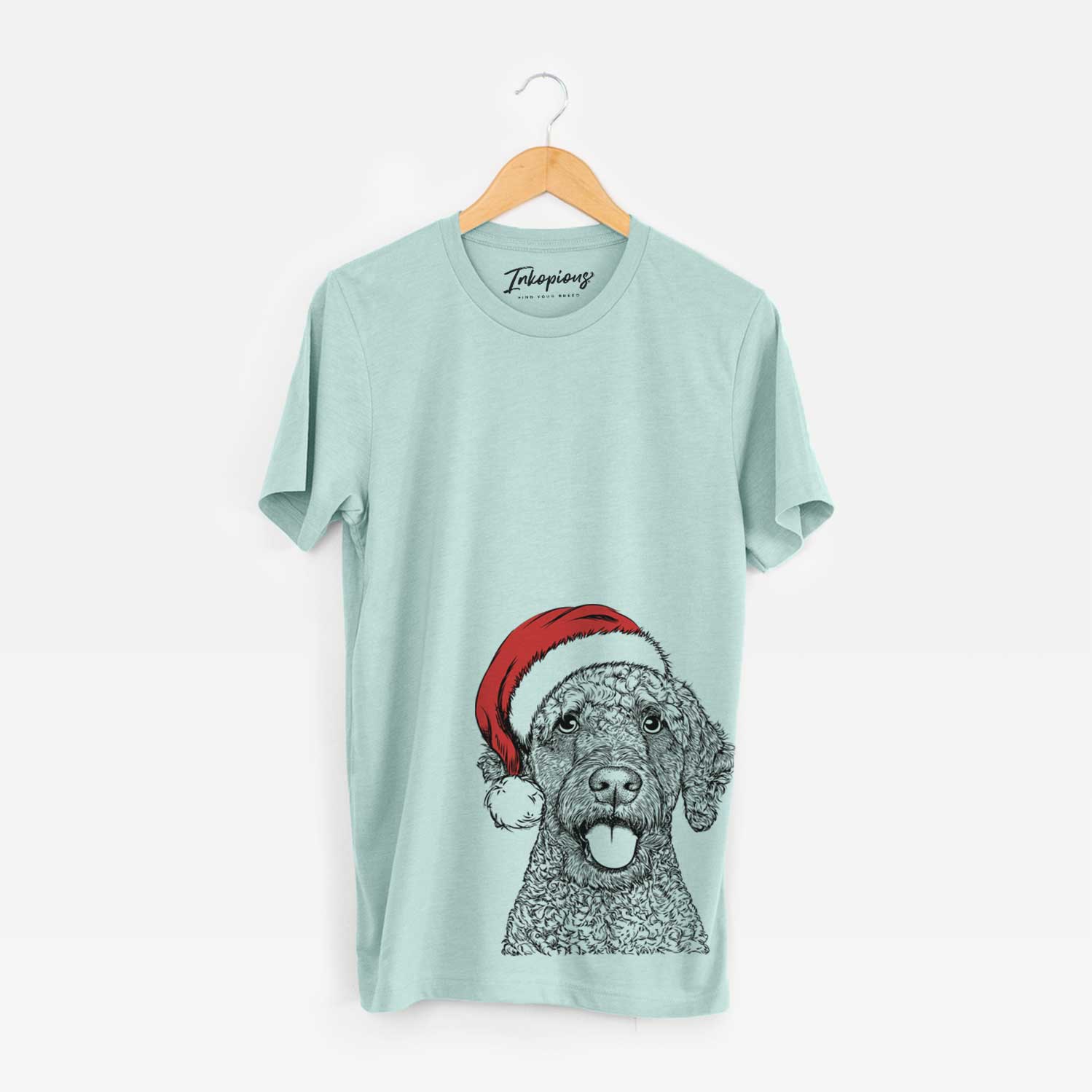 Hand-drawn sketch of Reina the Spanish Water Dog wearing a Santa hat on a Heather Sage Unisex crewneck