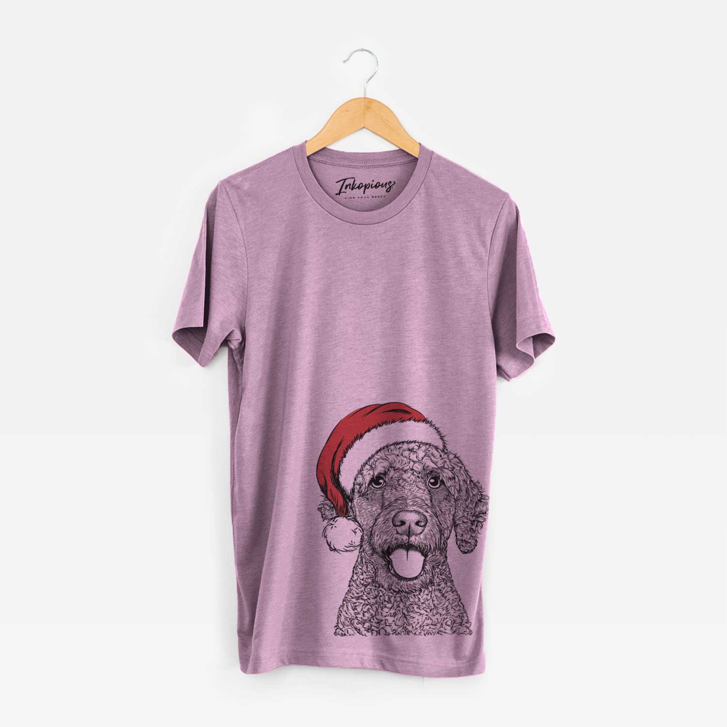 Hand-drawn sketch of Reina the Spanish Water Dog wearing a Santa hat on an Orchid Unisex crewneck