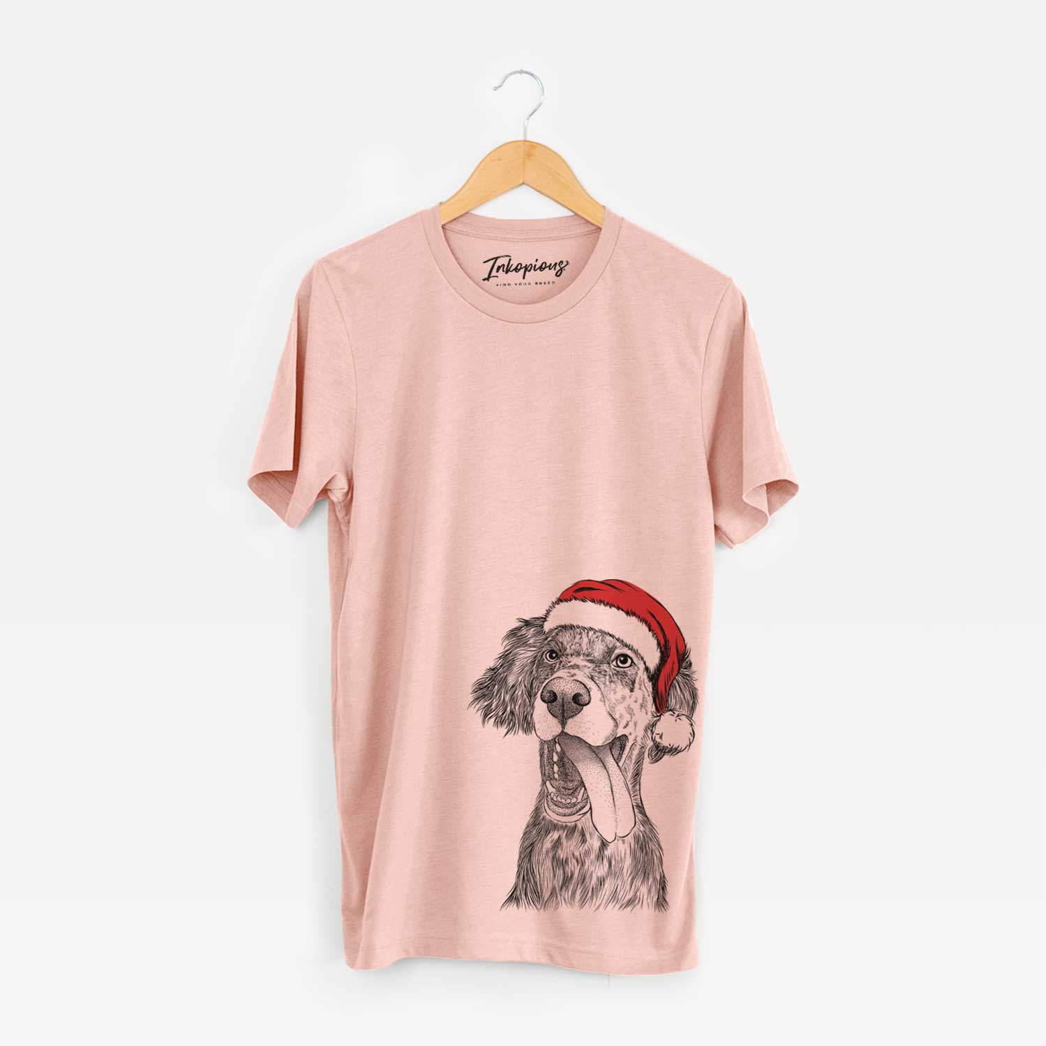 Hand-drawn sketch of Renly the English Setter wearing a Santa hat on a Peach Unisex crewneck