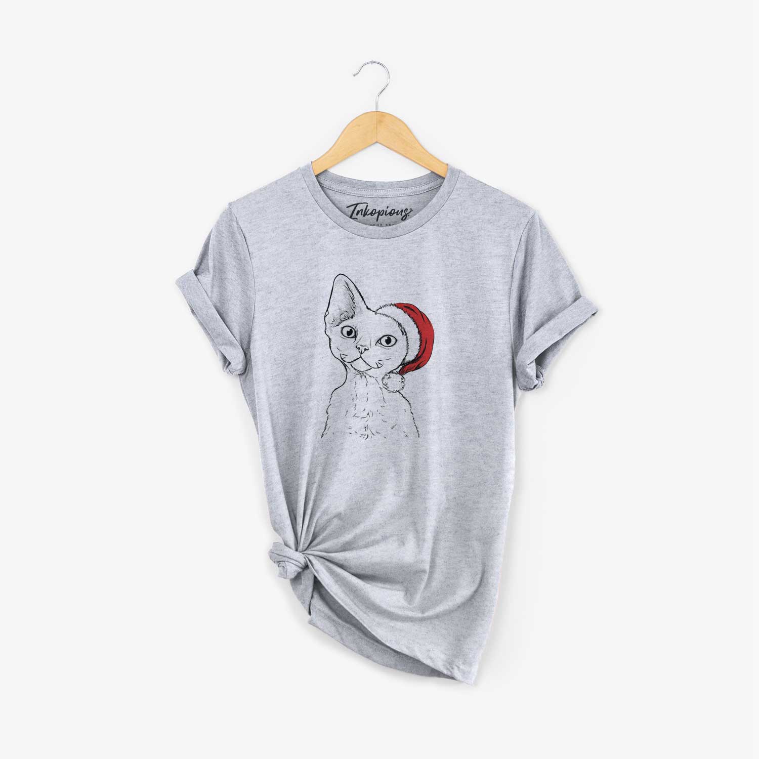 Hand-drawn sketch of Ripley the Devon Rex Cat wearing a Santa hat on a Grey Unisex crewneck