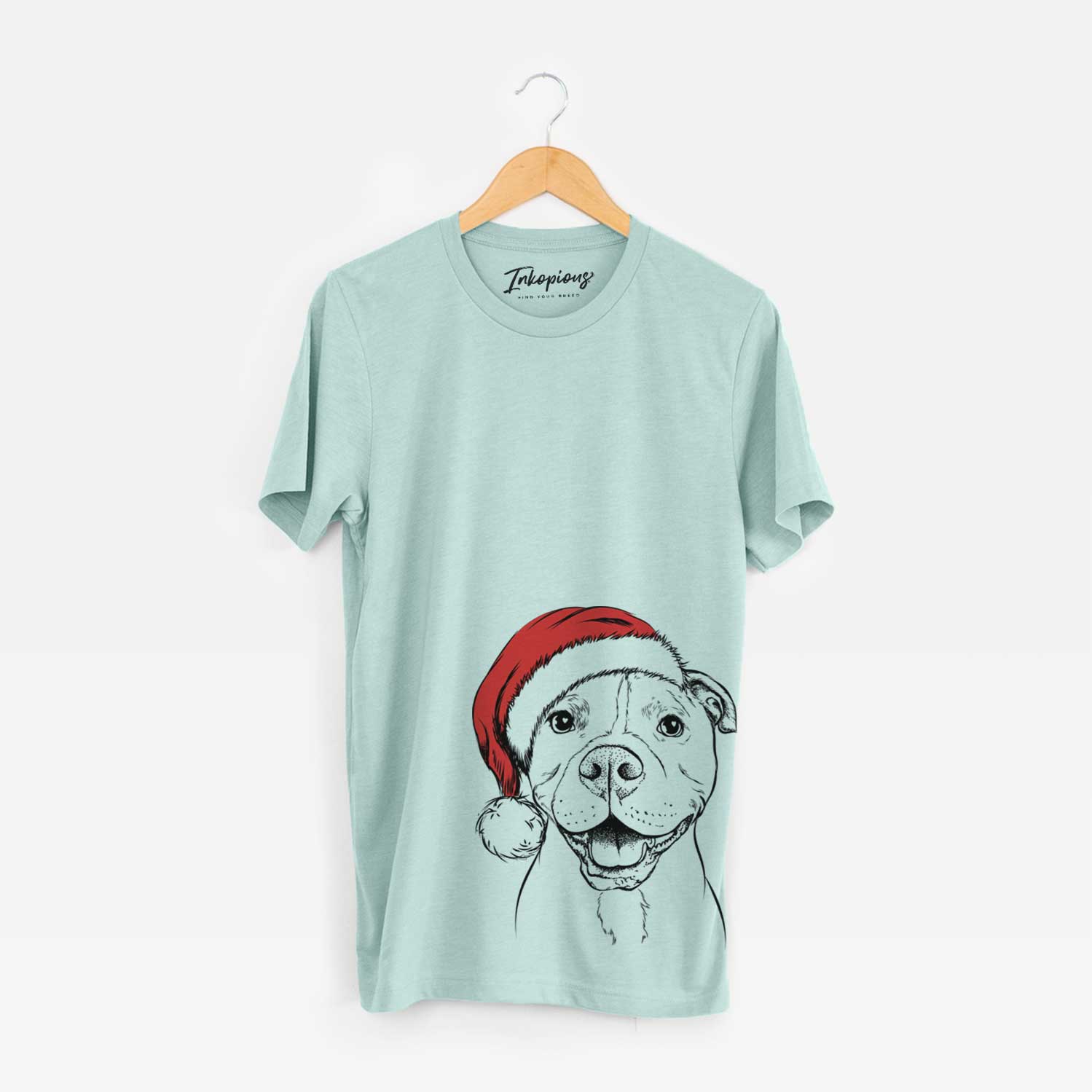Hand-drawn sketch of Roscoe the Pitbull wearing a Santa hat on a Heather Sage Unisex crewneck