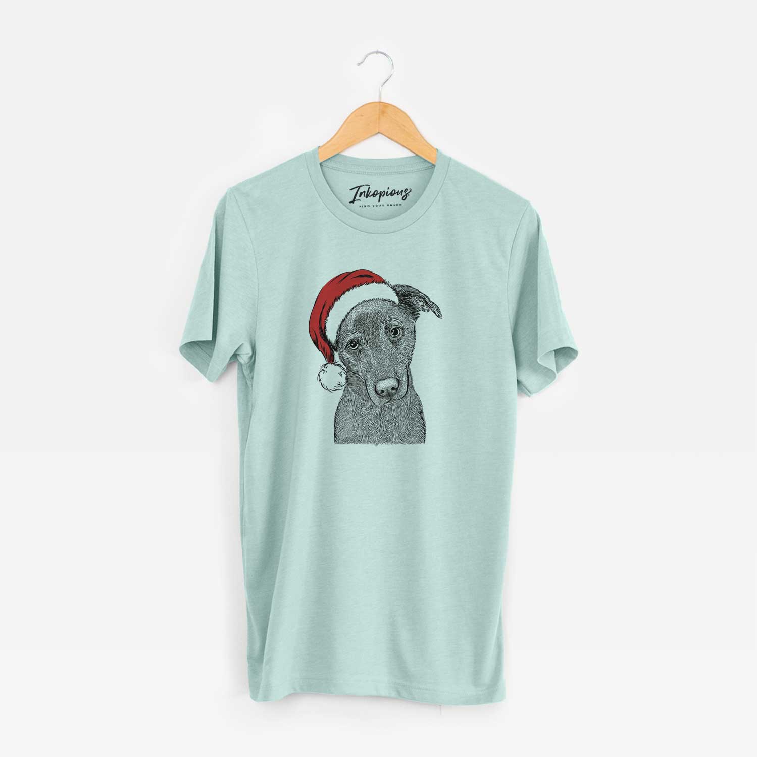 Hand-drawn sketch of Sadie the Whipador wearing a Santa hat on a Heather Sage Unisex crewneck