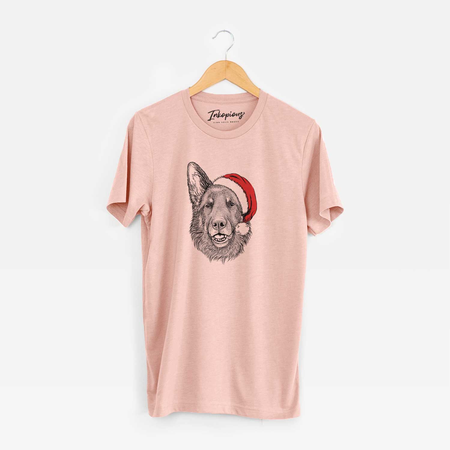 Hand-drawn sketch of Sammie the German Shepherd wearing a Santa hat on a Peach Unisex crewneck