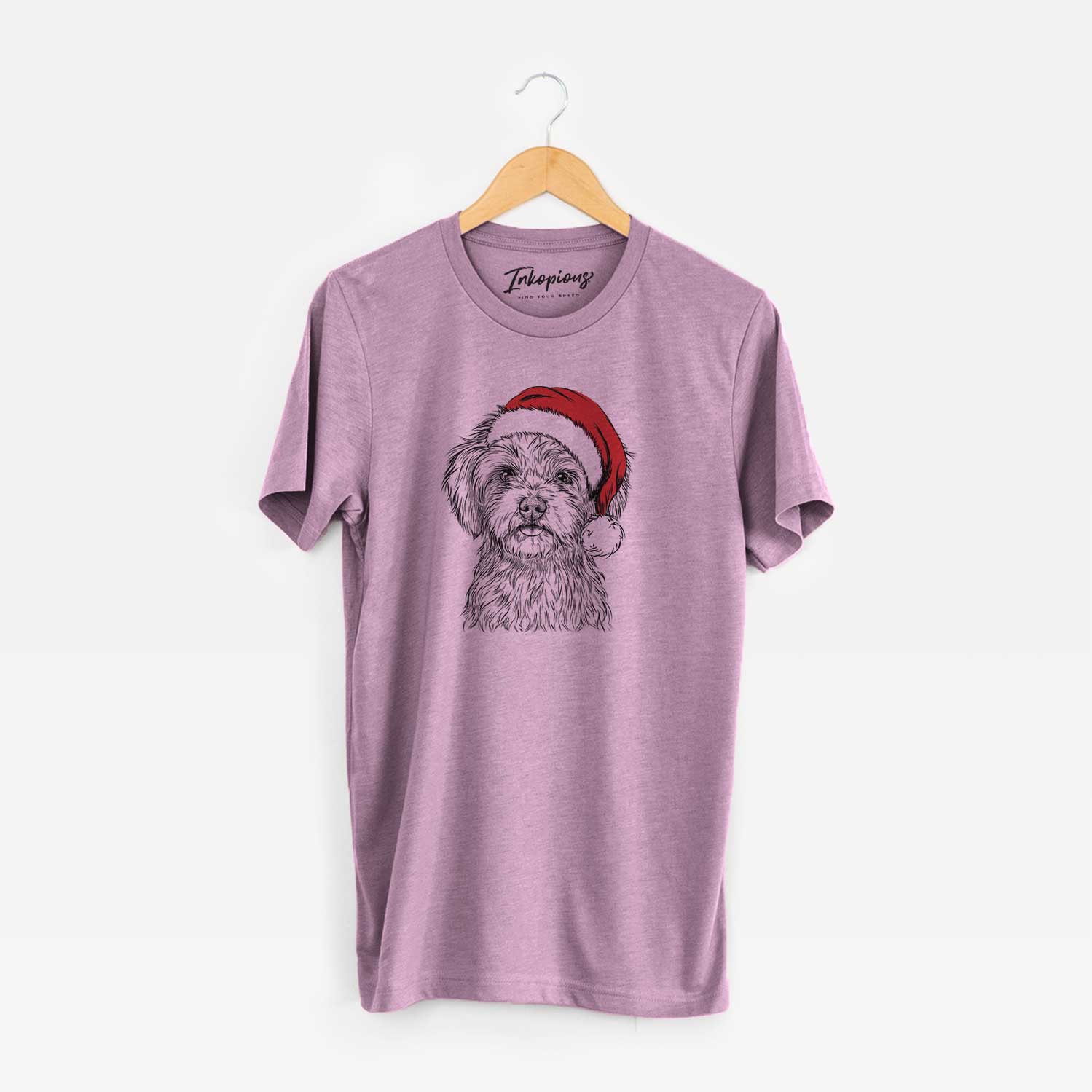 Hand-drawn sketch of Sammy the Shorkie wearing a Santa hat on an Orchid Unisex crewneck