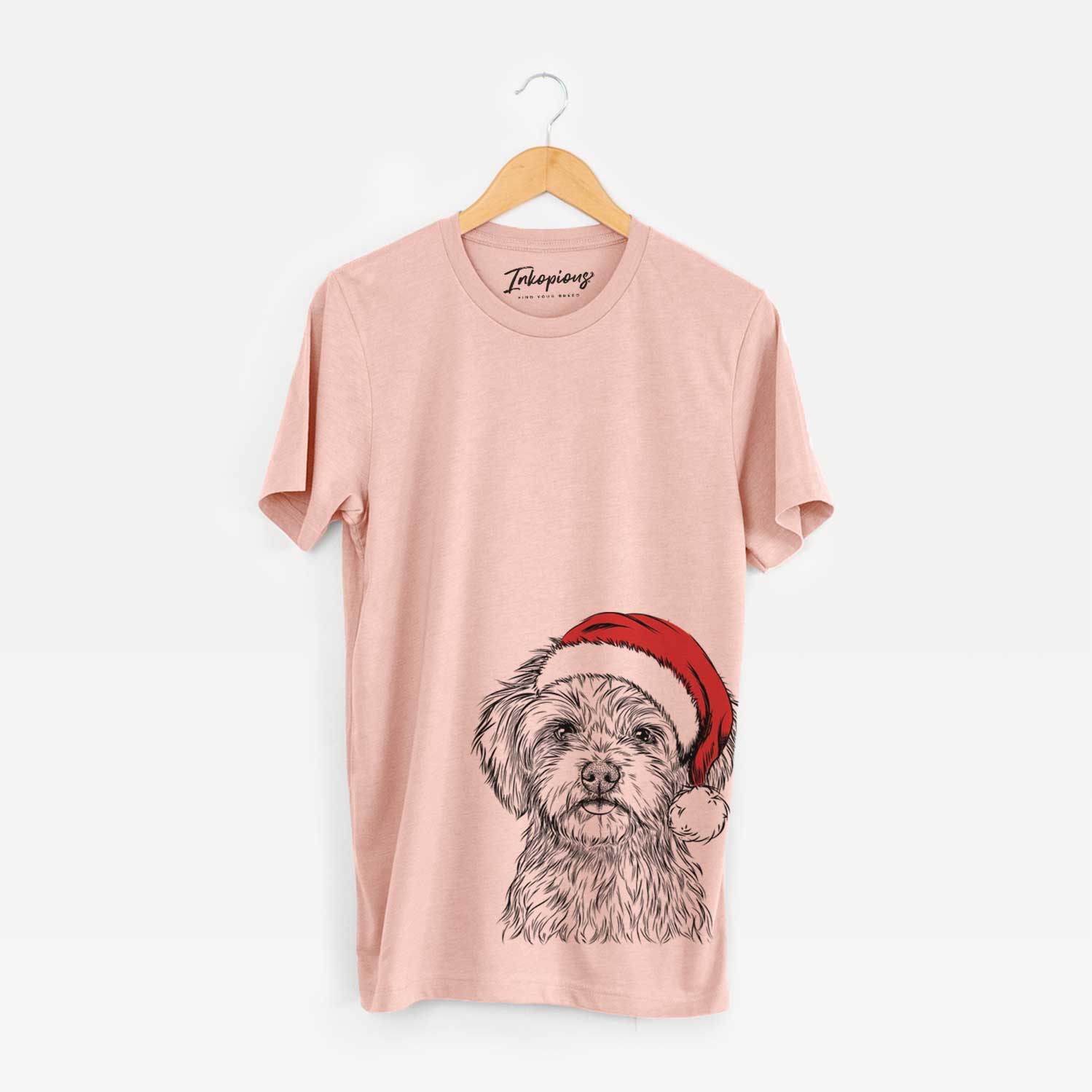 Hand-drawn sketch of Sammy the Shorkie wearing a Santa hat on a Peach Unisex crewneck