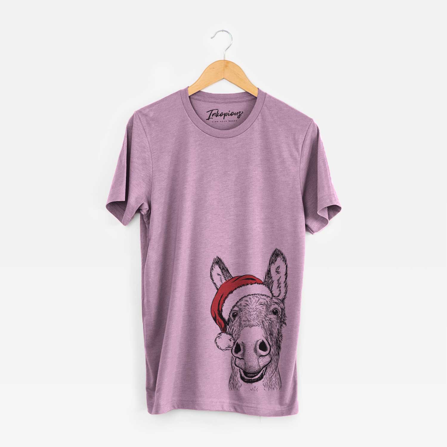Hand-drawn sketch of Samule the Donkey wearing a Santa hat on an Orchid Unisex crewneck