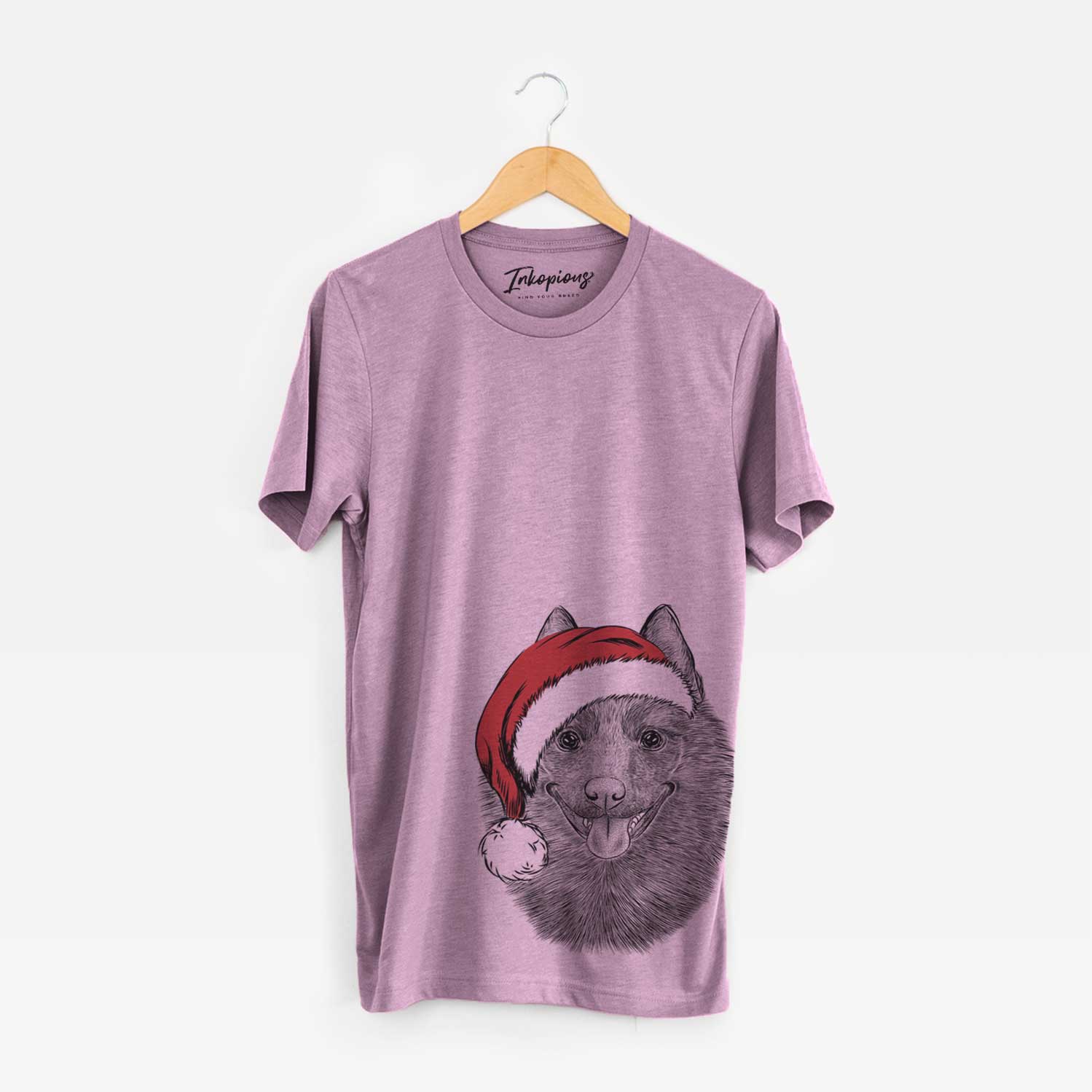 Hand-drawn sketch of Sander the Schipperke wearing a Santa hat on an Orchid Unisex crewneck