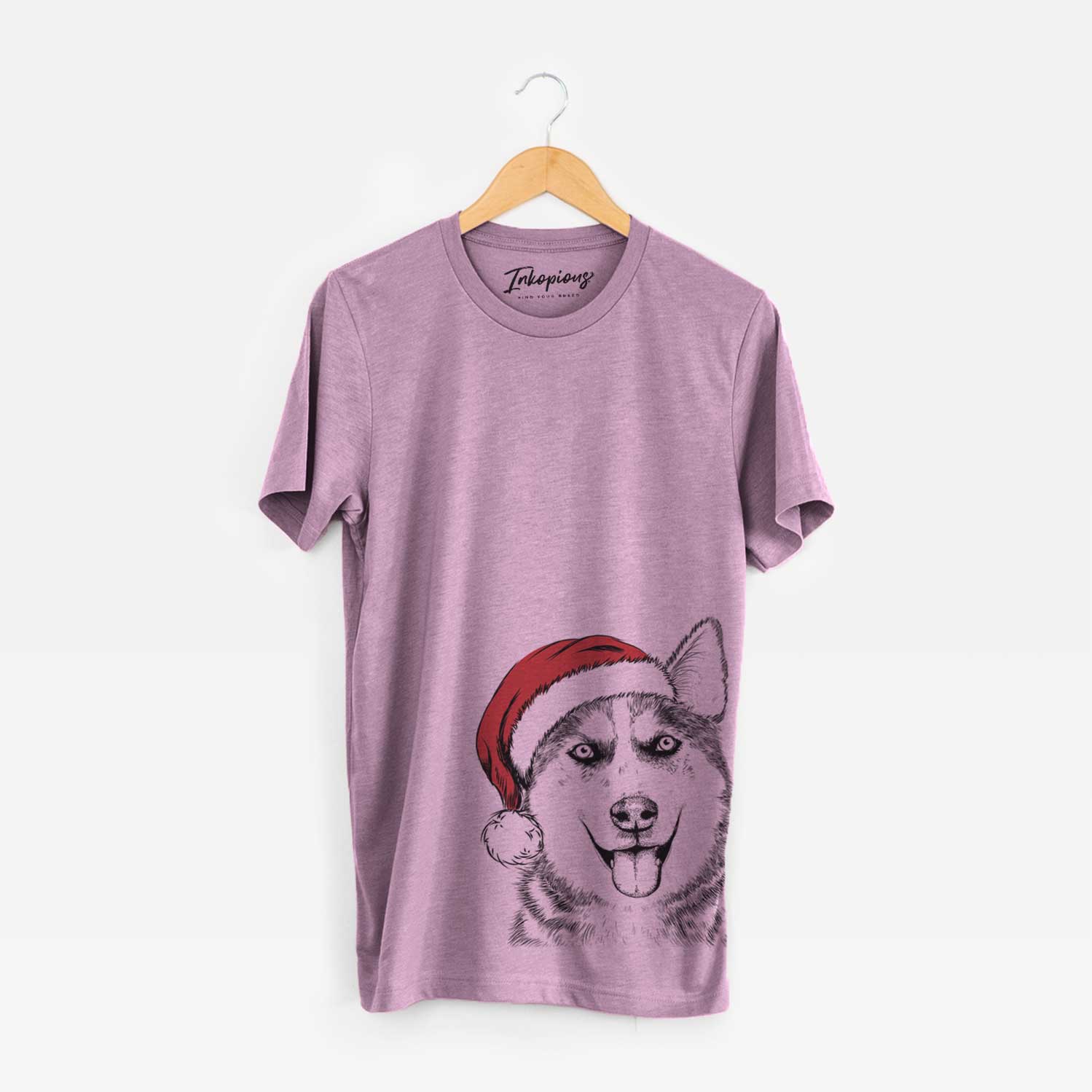 Hand-drawn sketch of Sesi the Siberian Husky wearing a Santa hat on an Orchid Unisex crewneck