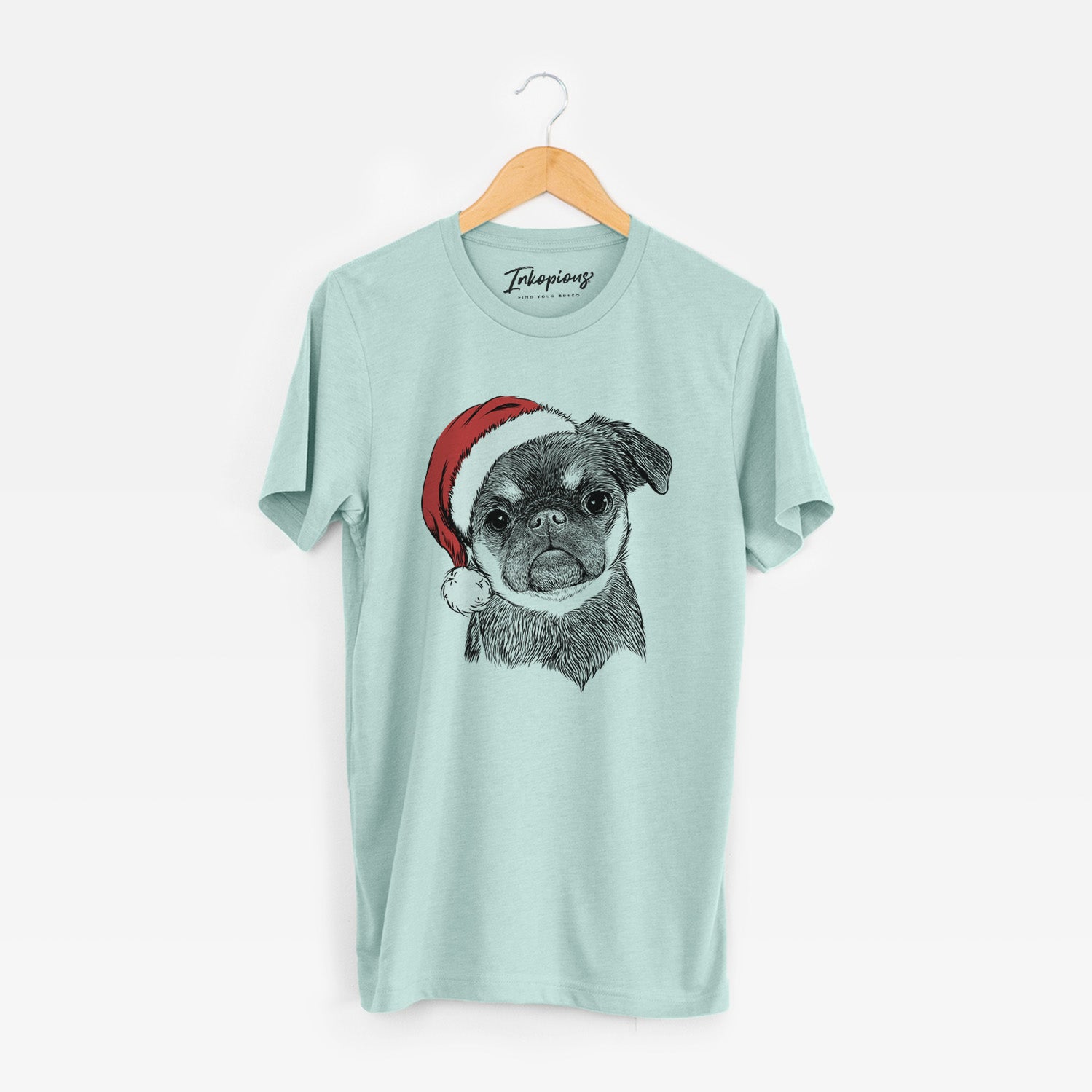 Hand-drawn sketch of Simone the Brussels Griffon wearing a Santa hat on a Heather Sage Unisex crewneck