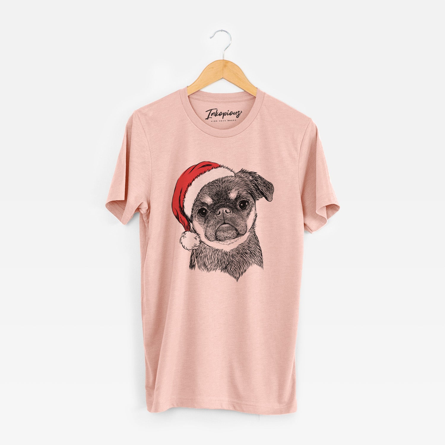 Hand-drawn sketch of Simone the Brussels Griffon wearing a Santa hat on a Peach Unisex crewneck