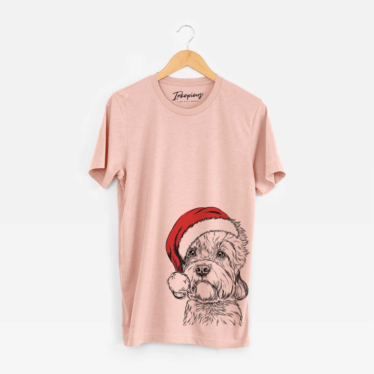 Hand-drawn sketch of Sir Walter the Dandie Dinmont Terrier wearing a Santa hat on a Peach Unisex crewneck
