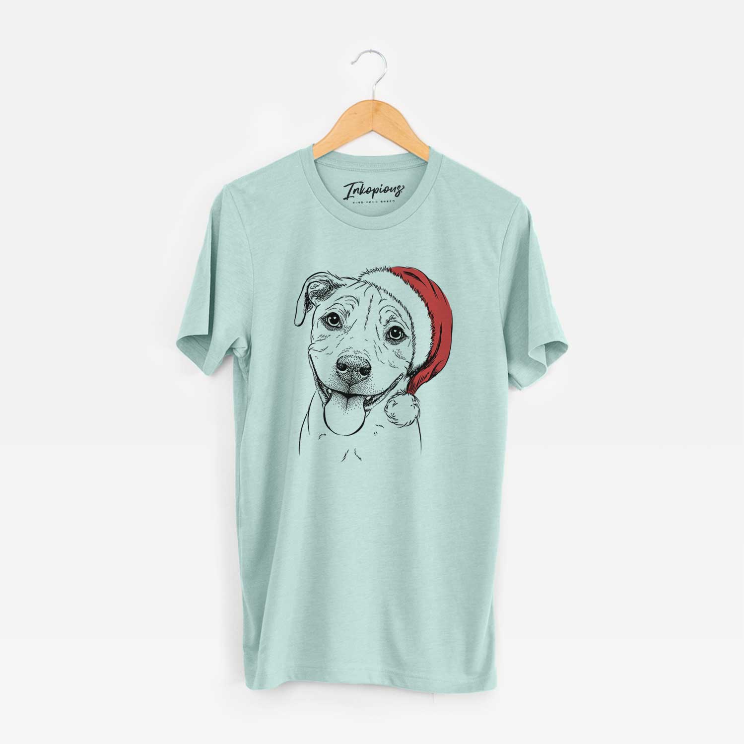 Hand-drawn sketch of Skye the Pitweiler wearing a Santa hat on a Heather Sage Unisex crewneck