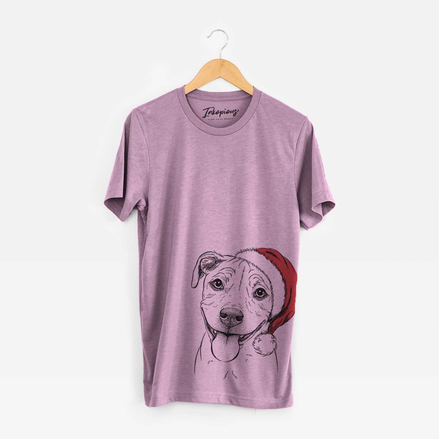 Hand-drawn sketch of Skye the Pitweiler wearing a Santa hat on an Orchid Unisex crewneck