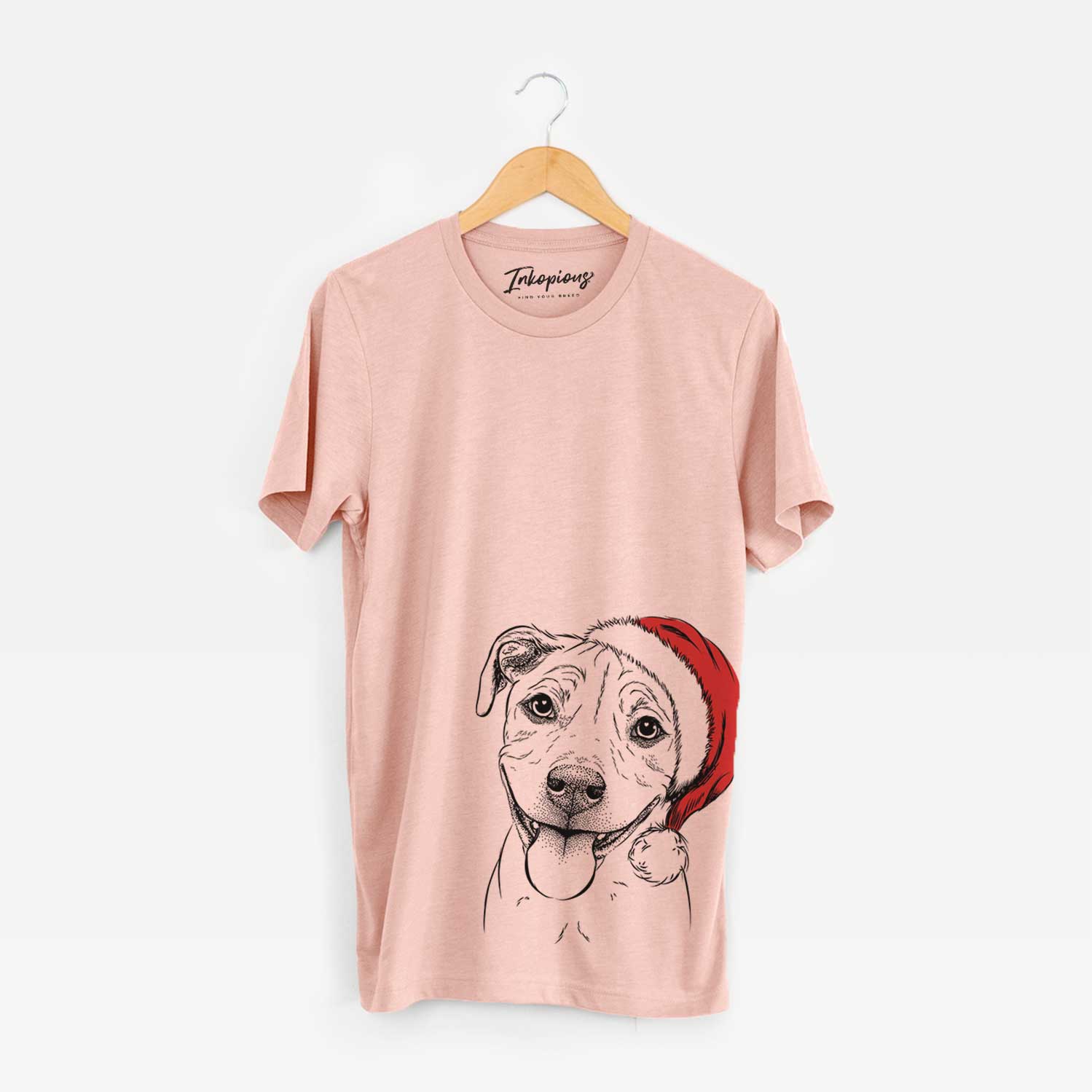 Hand-drawn sketch of Skye the Pitweiler wearing a Santa hat on a Peach Unisex crewneck