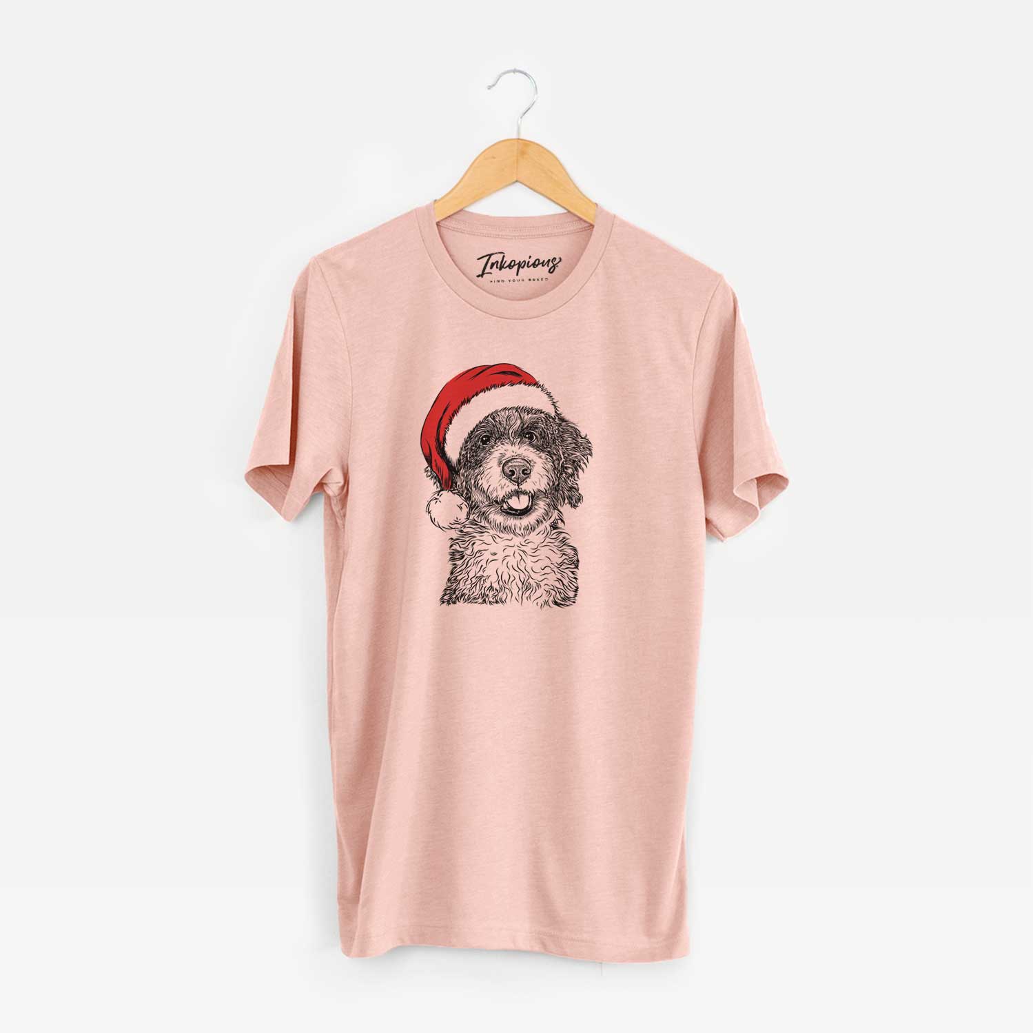 Hand-drawn sketch of Smoky the Bernedoodle Puppy wearing a Santa hat on a Peach Unisex crewneck