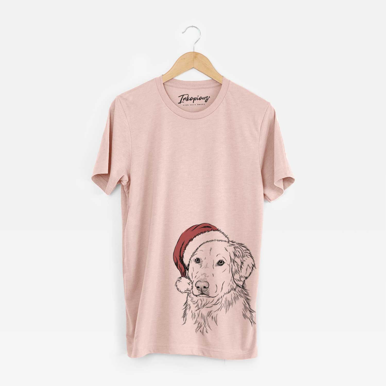 Hand-drawn sketch of Spencer the Golden Retriever wearing a Santa hat on a Peach Unisex crewneck
