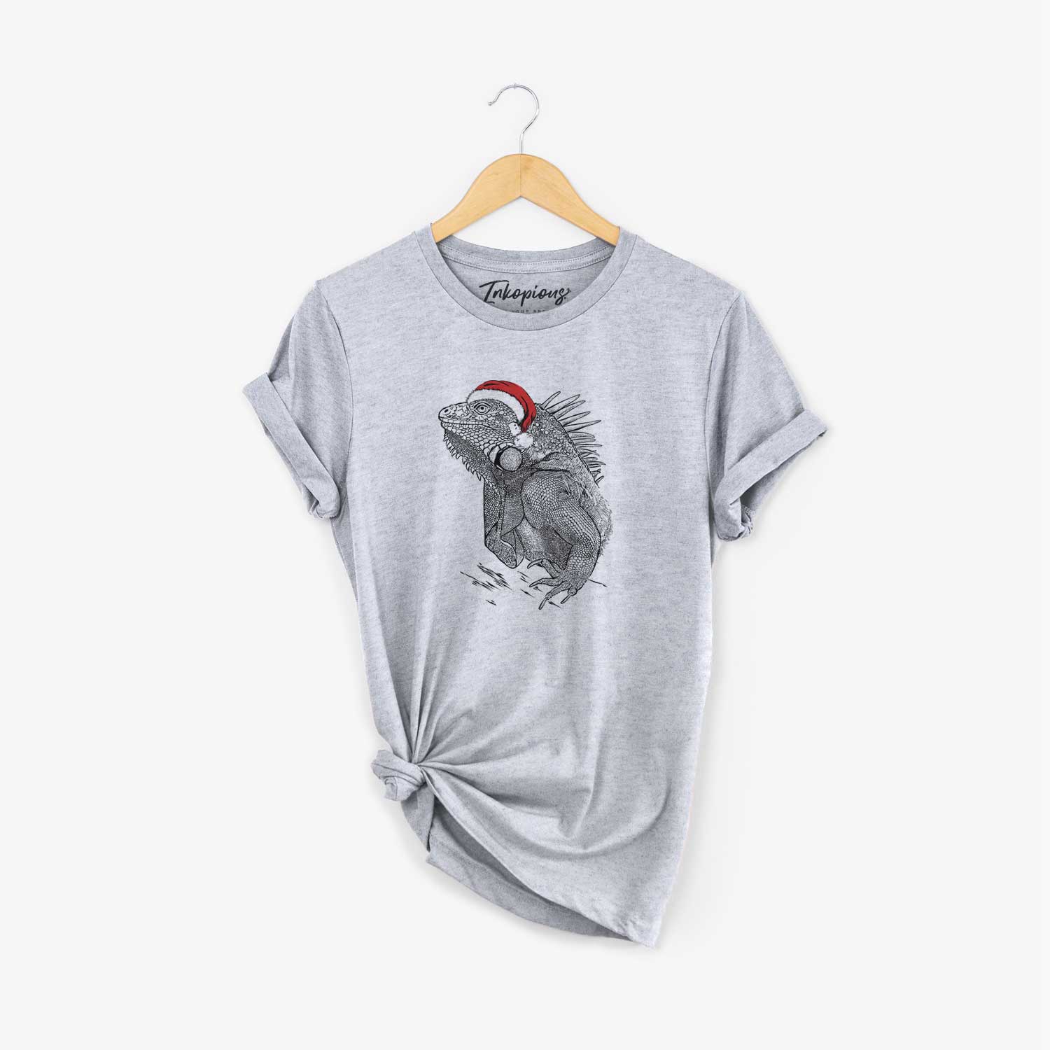 Hand-drawn sketch of Spike the Iguana wearing a Santa hat on a Grey Unisex crewneck