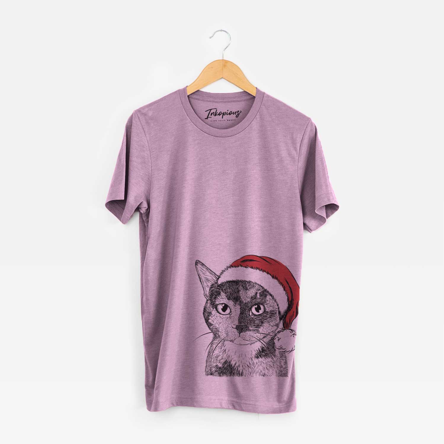 Hand-drawn sketch of Spooky Kitty the Tortoiseshell Cat wearing a Santa hat on an Orchid Unisex crewneck