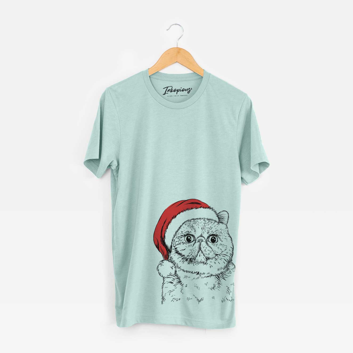 Hand-drawn sketch of Squish the Exotic Shorthair Cat wearing a Santa hat on a Heather Sage Unisex crewneck