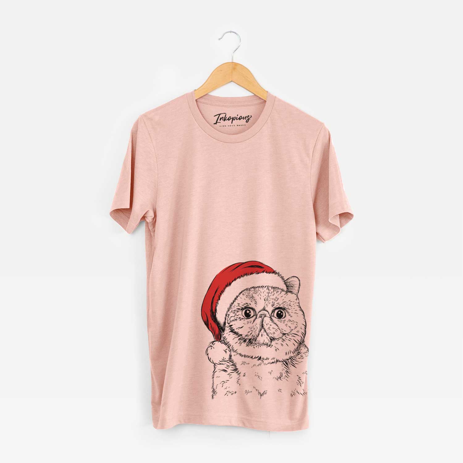 Hand-drawn sketch of Squish the Exotic Shorthair Cat wearing a Santa hat on a Peach Unisex crewneck
