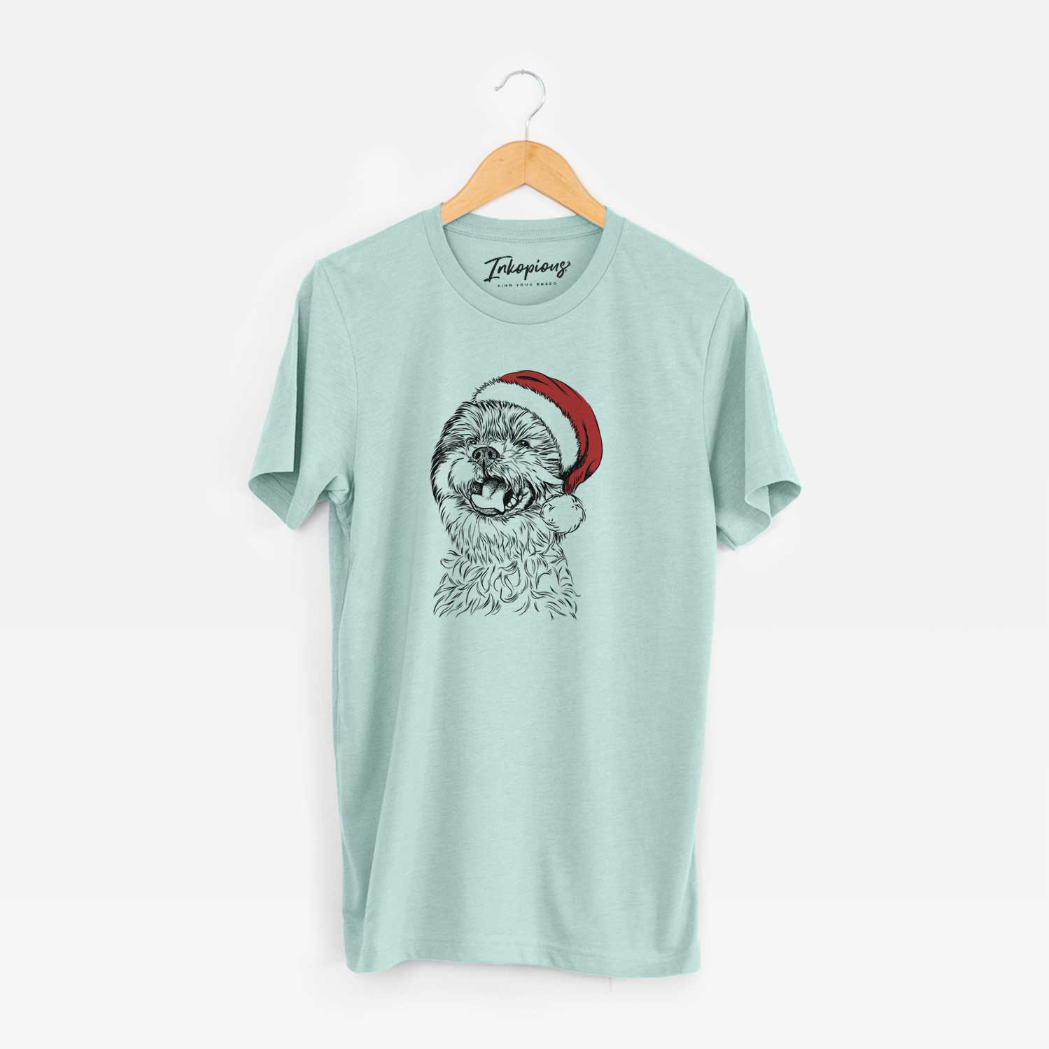 Hand-drawn sketch of Sugar the Malshi wearing a Santa hat on a Heather Sage Unisex crewneck