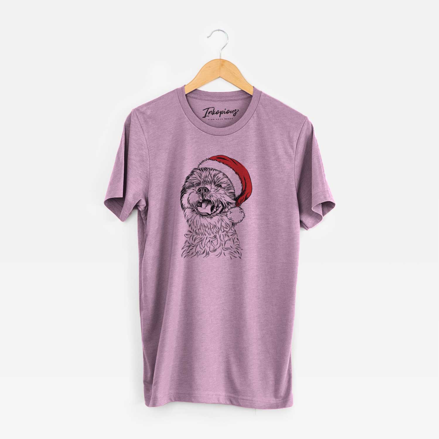 Hand-drawn sketch of Sugar the Malshi wearing a Santa hat on an Orchid Unisex crewneck