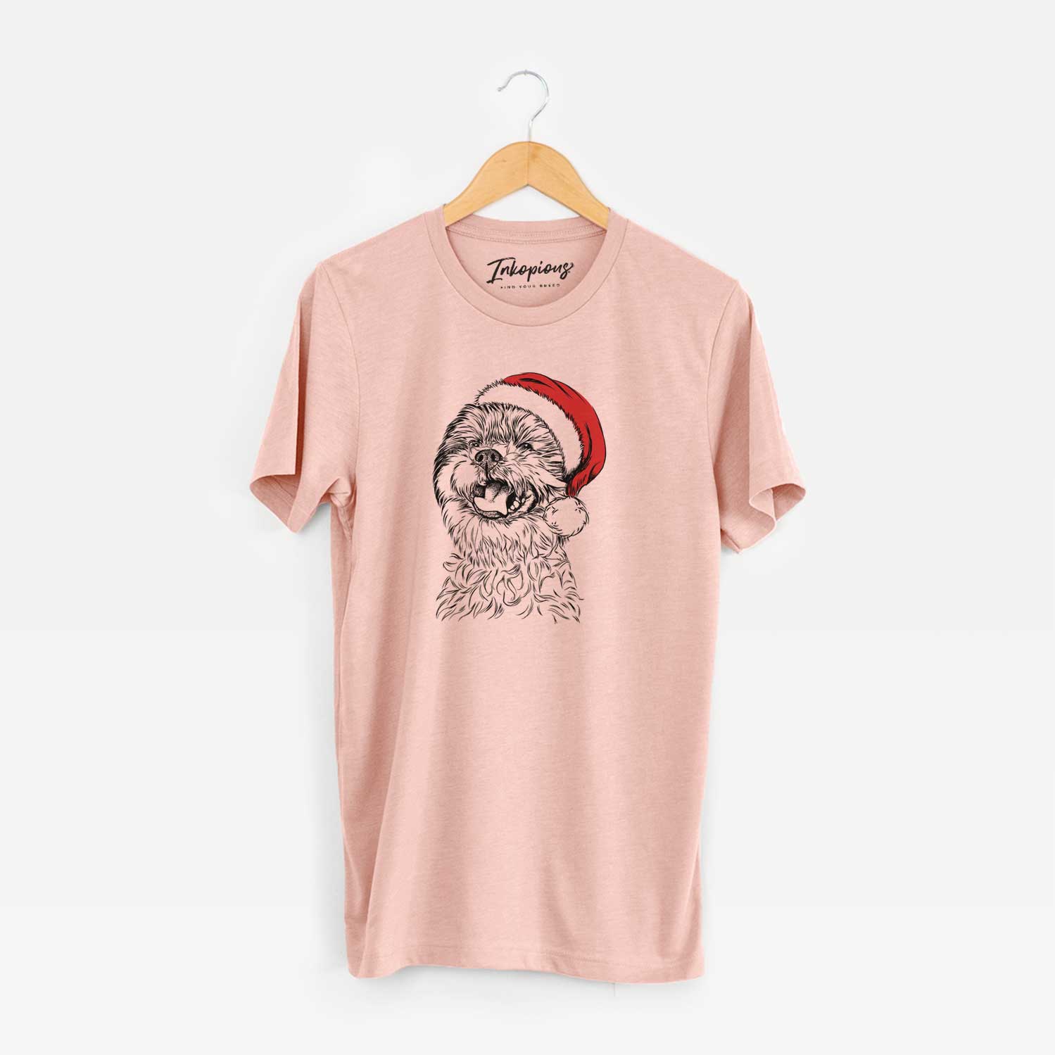 Hand-drawn sketch of Sugar the Malshi wearing a Santa hat on a Peach Unisex crewneck