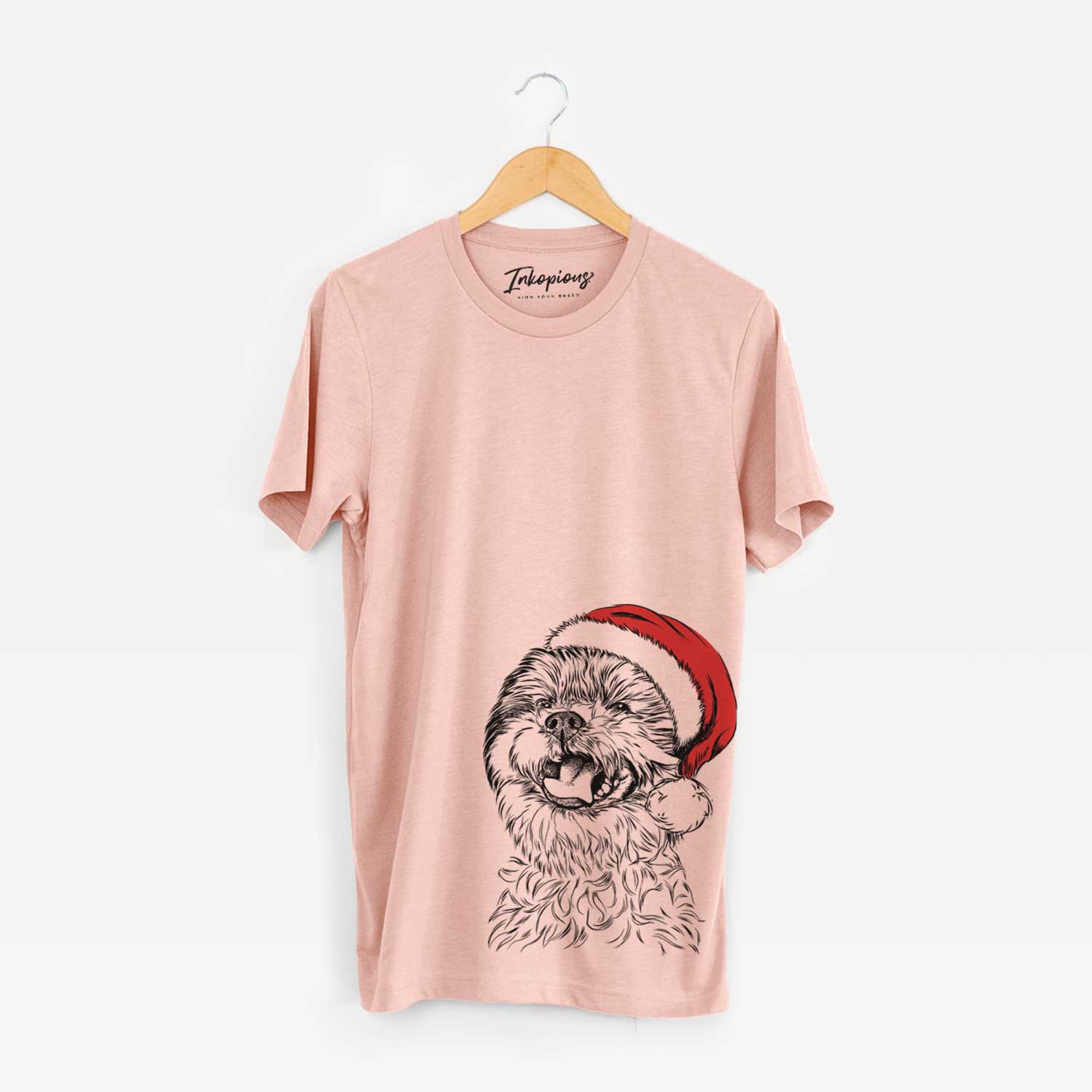 Hand-drawn sketch of Sugar the Malshi wearing a Santa hat on a Peach Unisex crewneck