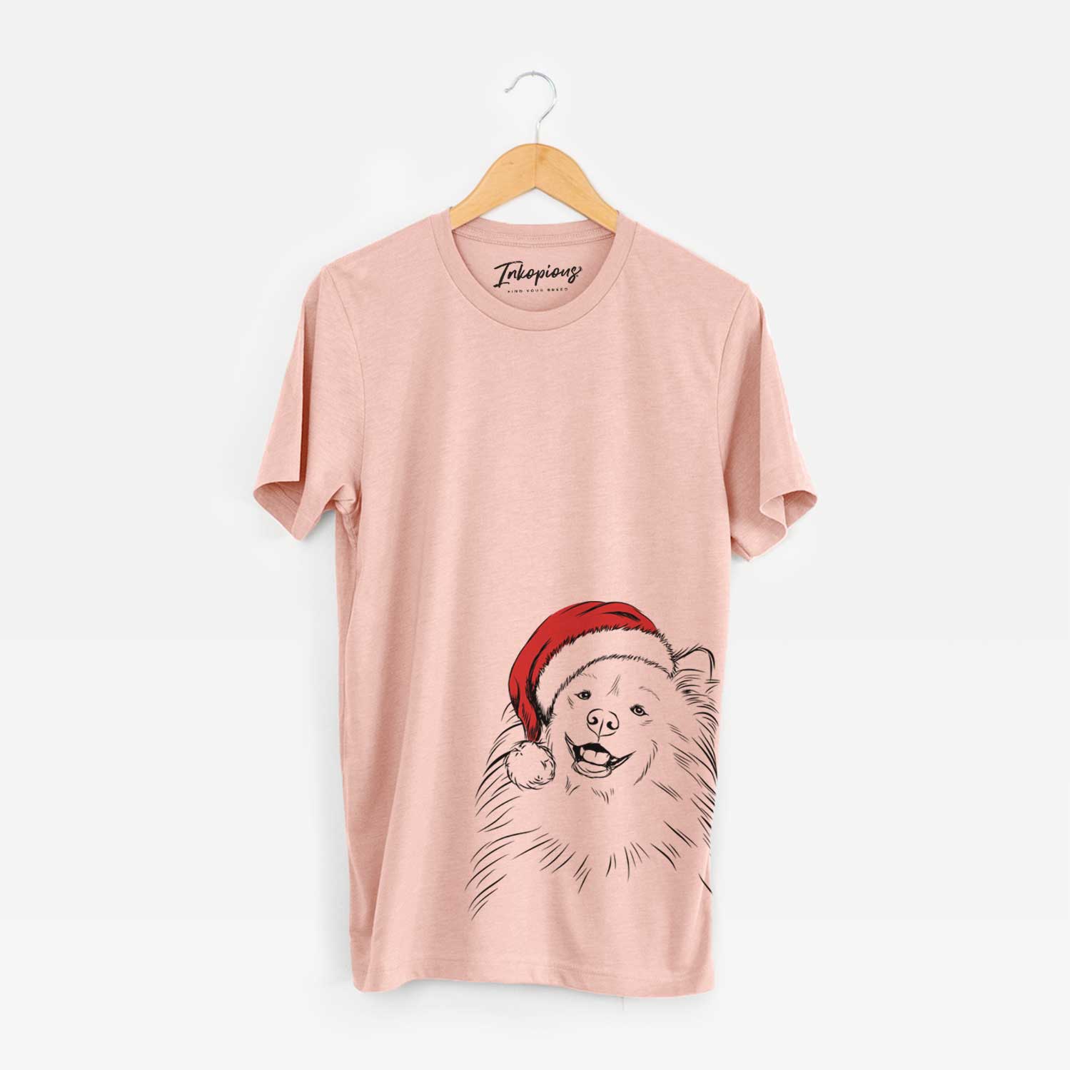 Hand-drawn sketch of Tillie the Samoyed wearing a Santa hat on a Peach Unisex crewneck