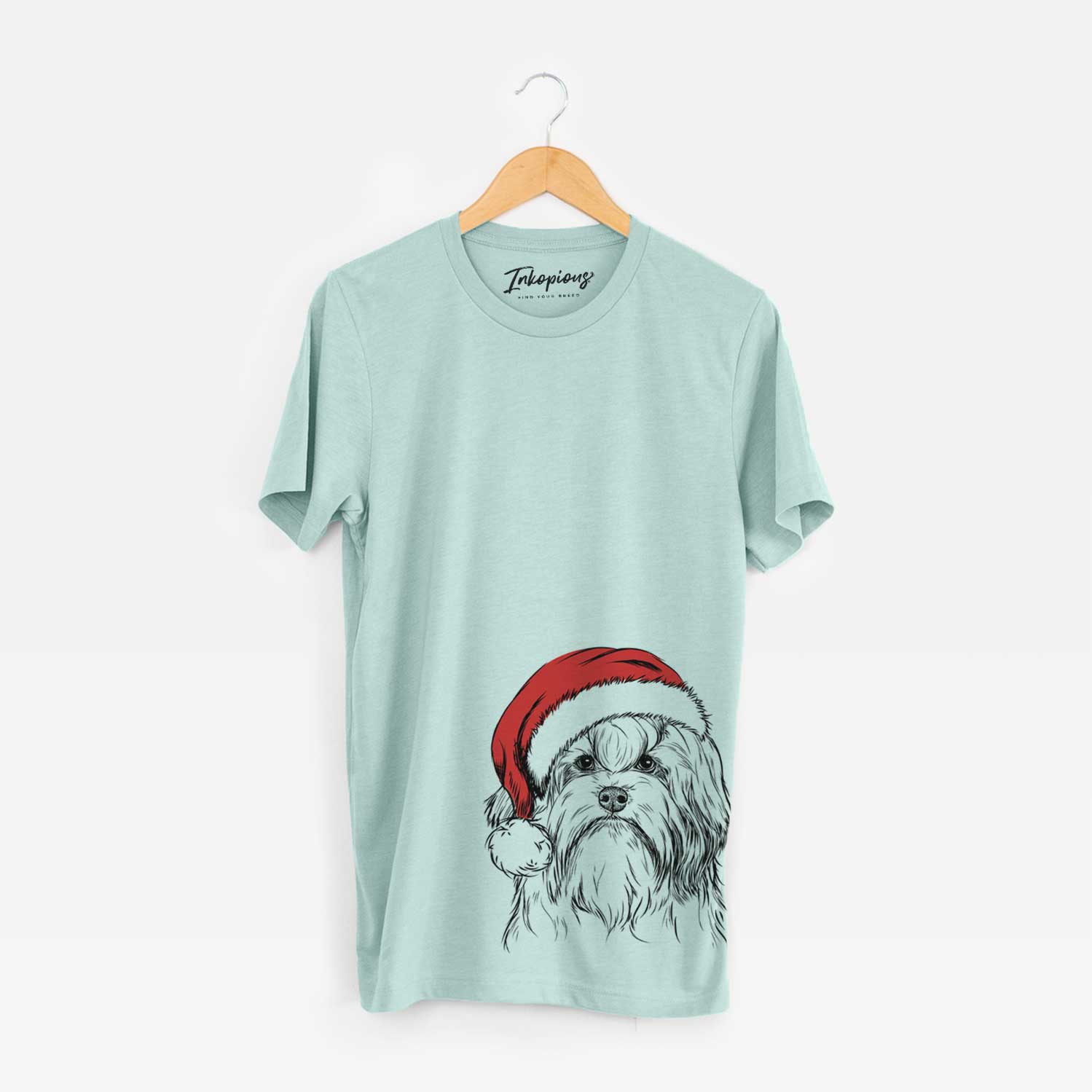 Hand-drawn sketch of Tootsie the Lowchen wearing a Santa hat on a Heather Sage Unisex crewneck