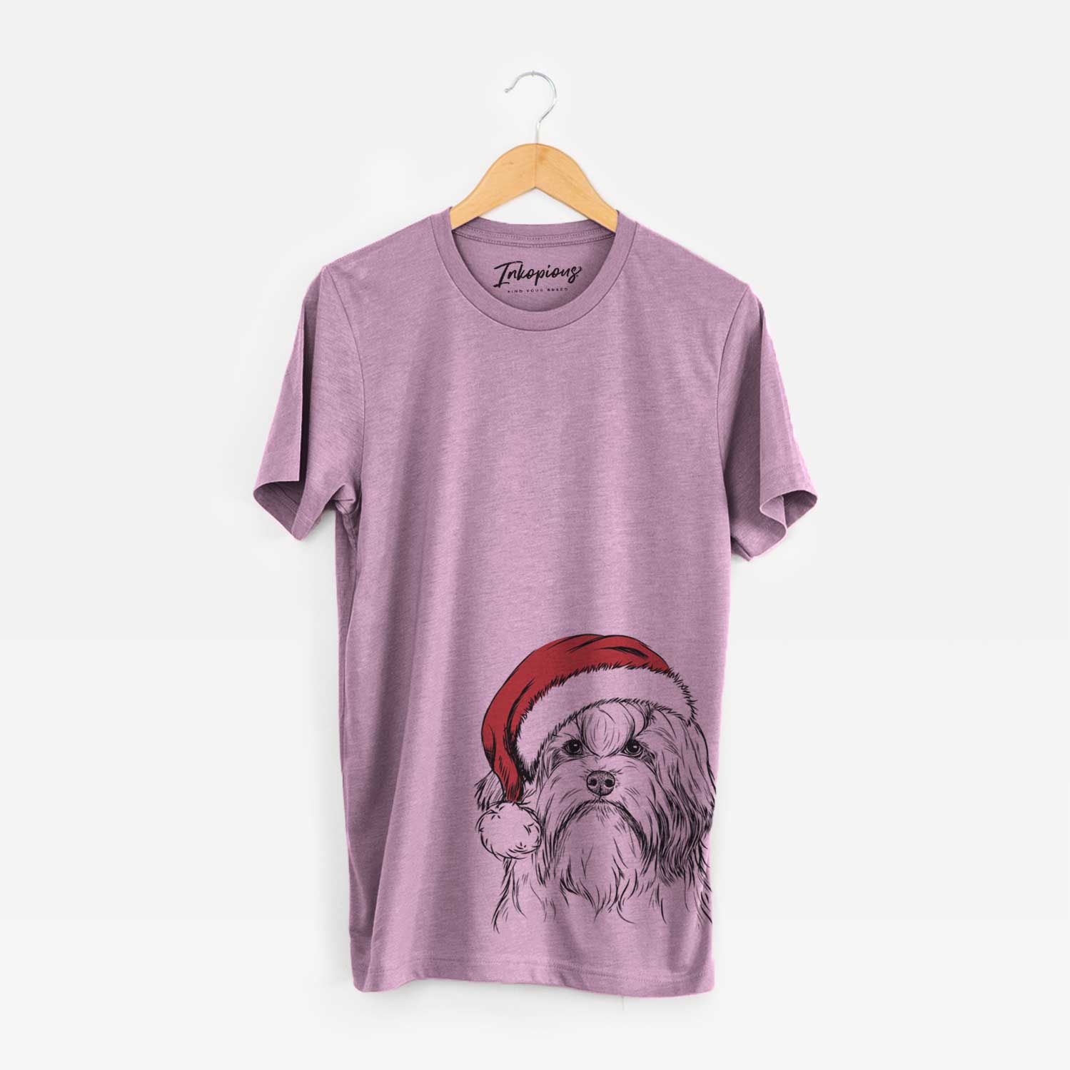 Hand-drawn sketch of Tootsie the Lowchen wearing a Santa hat on an Orchid Unisex crewneck