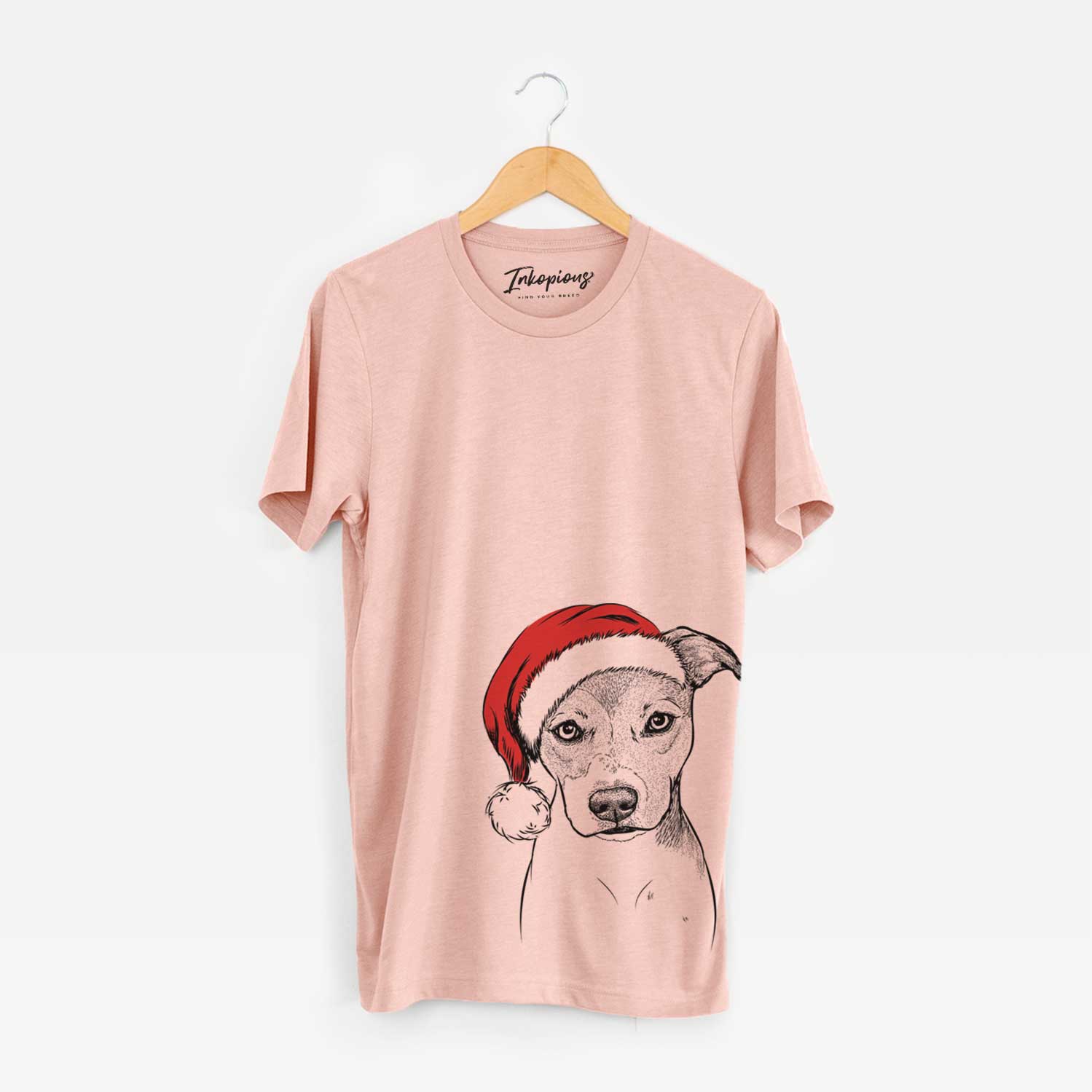 Hand-drawn sketch of Tula the American Staffordshire Terrier Heeler Mix wearing a Santa hat on a Peach Unisex crewneck