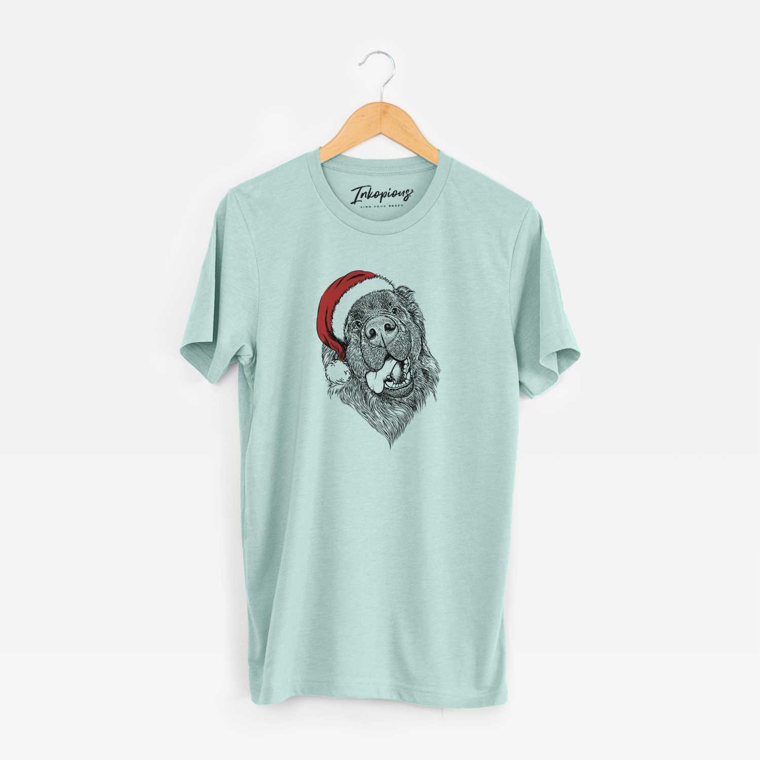Hand-drawn sketch of Tuna the Newfoundland wearing a Santa hat on a Heather Sage Unisex crewneck