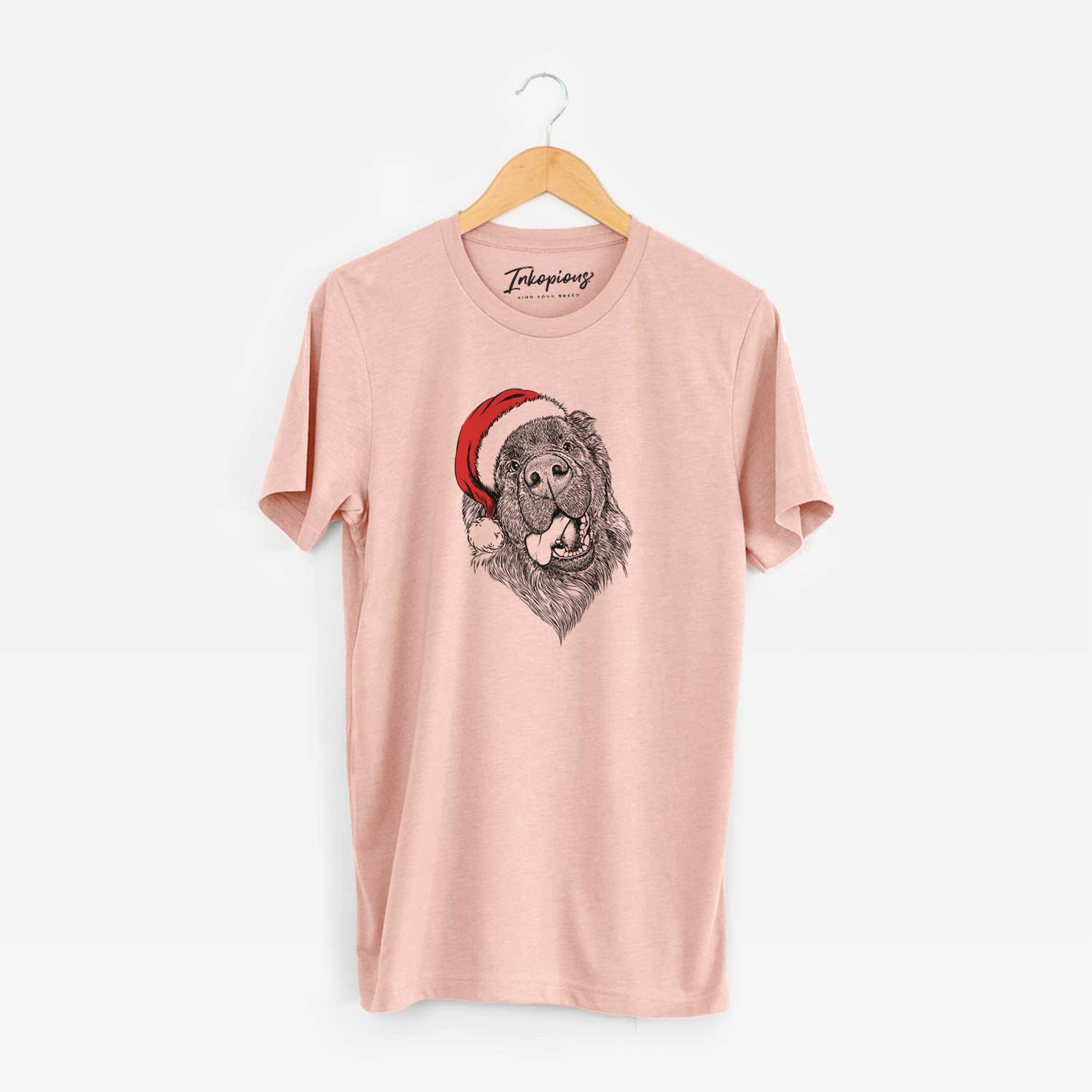 Hand-drawn sketch of Tuna the Newfoundland wearing a Santa hat on a Peach Unisex crewneck