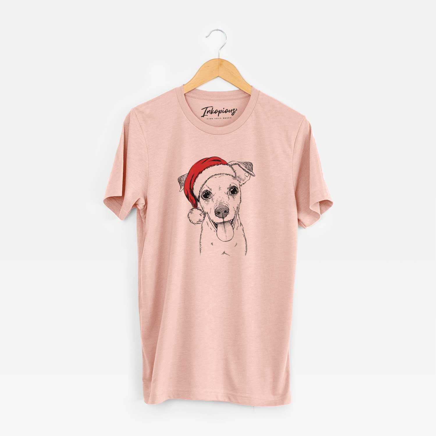 Hand-drawn sketch of Tyler the Mixed Breed wearing a Santa hat on a Peach Unisex crewneck