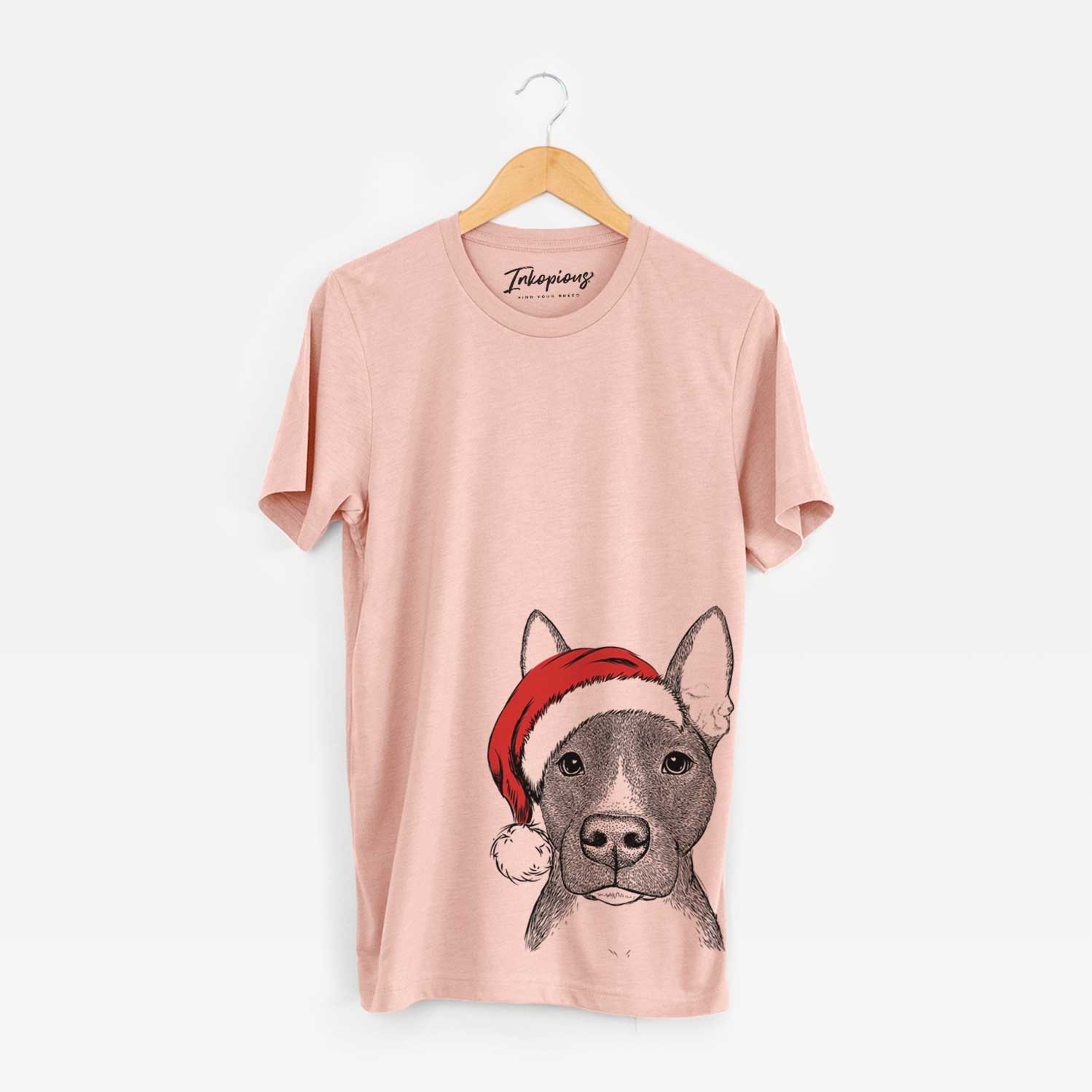 Hand-drawn sketch of Violet the Pitbull wearing a Santa hat on a Peach Unisex crewneck