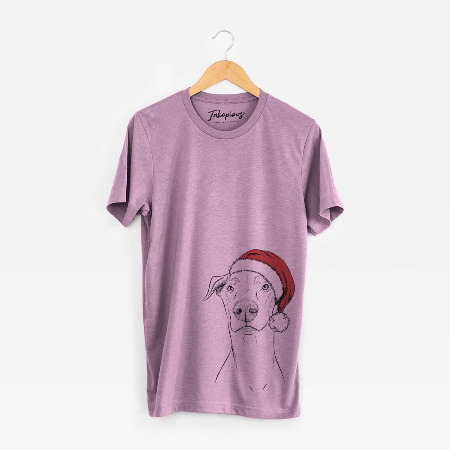 Hand-drawn sketch of Walter the White Doberman Rescue wearing a Santa hat on an Orchid Unisex crewneck