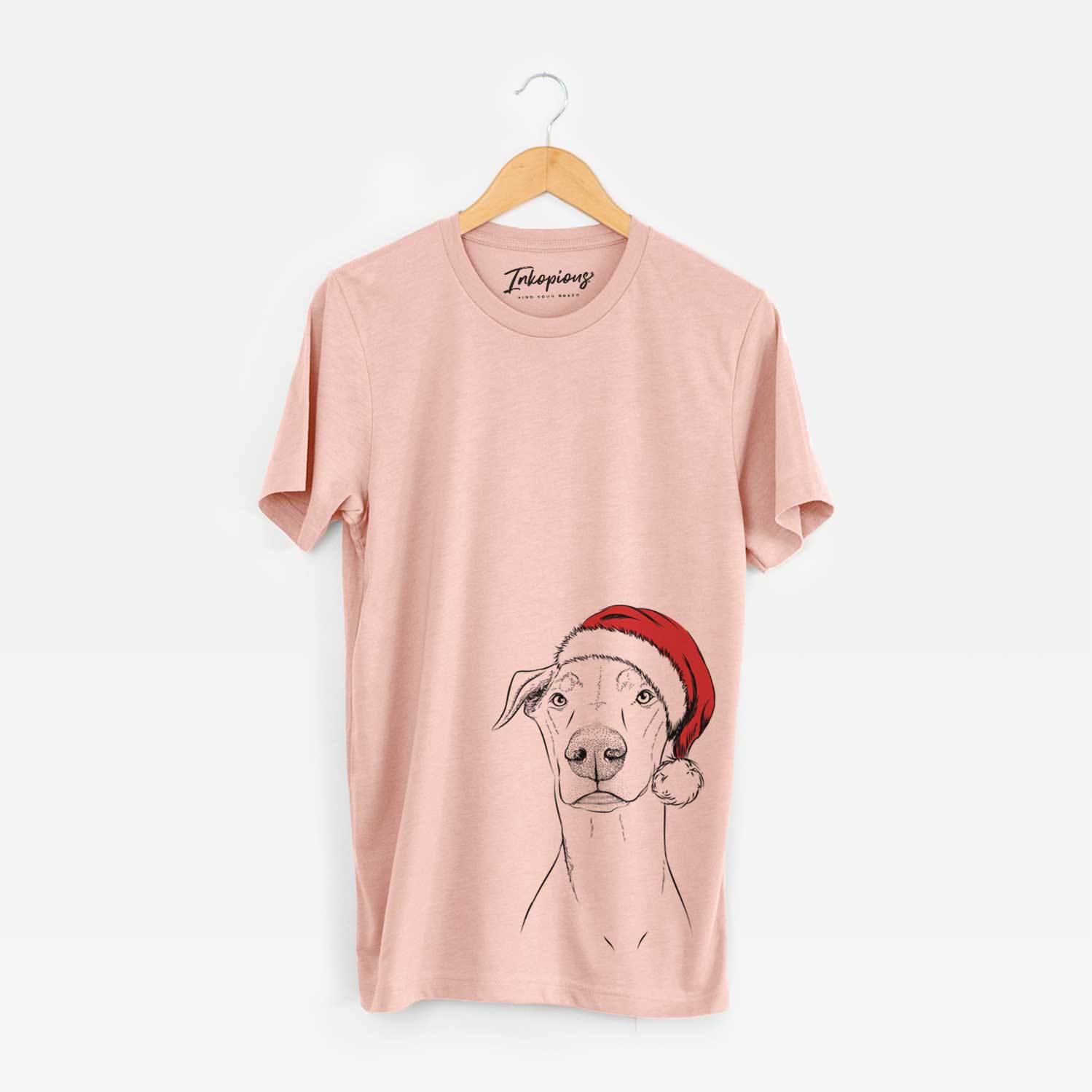 Hand-drawn sketch of Walter the White Doberman Rescue wearing a Santa hat on a Peach Unisex crewneck