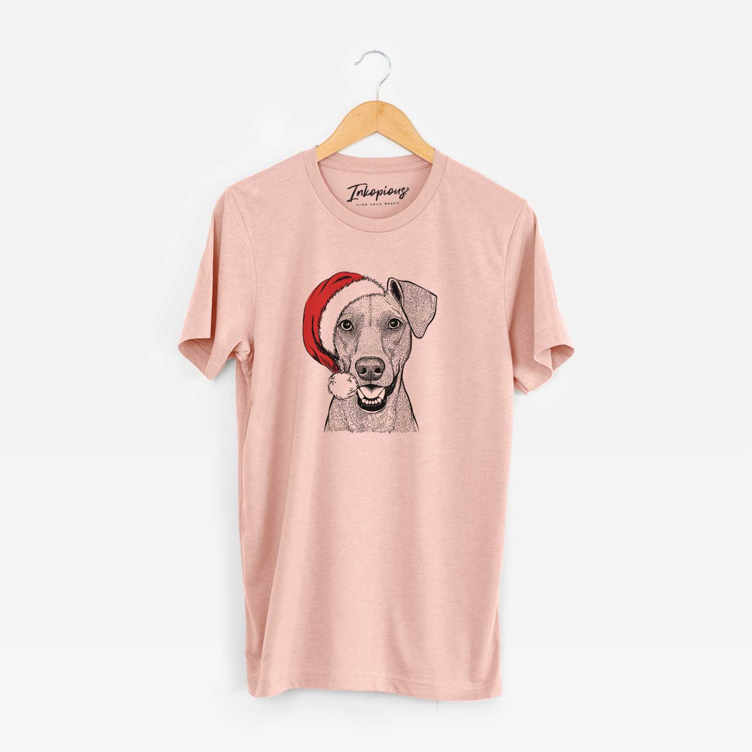 Hand-drawn sketch of Willow the German Pinscher wearing a Santa hat on a Peach Unisex crewneck
