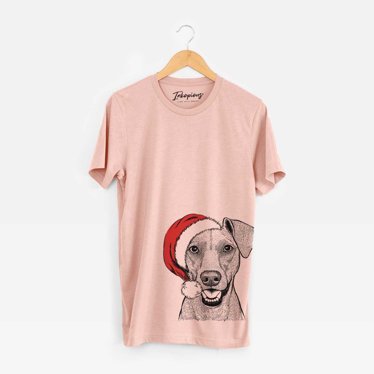 Hand-drawn sketch of Willow the German Pinscher wearing a Santa hat on a Peach Unisex crewneck