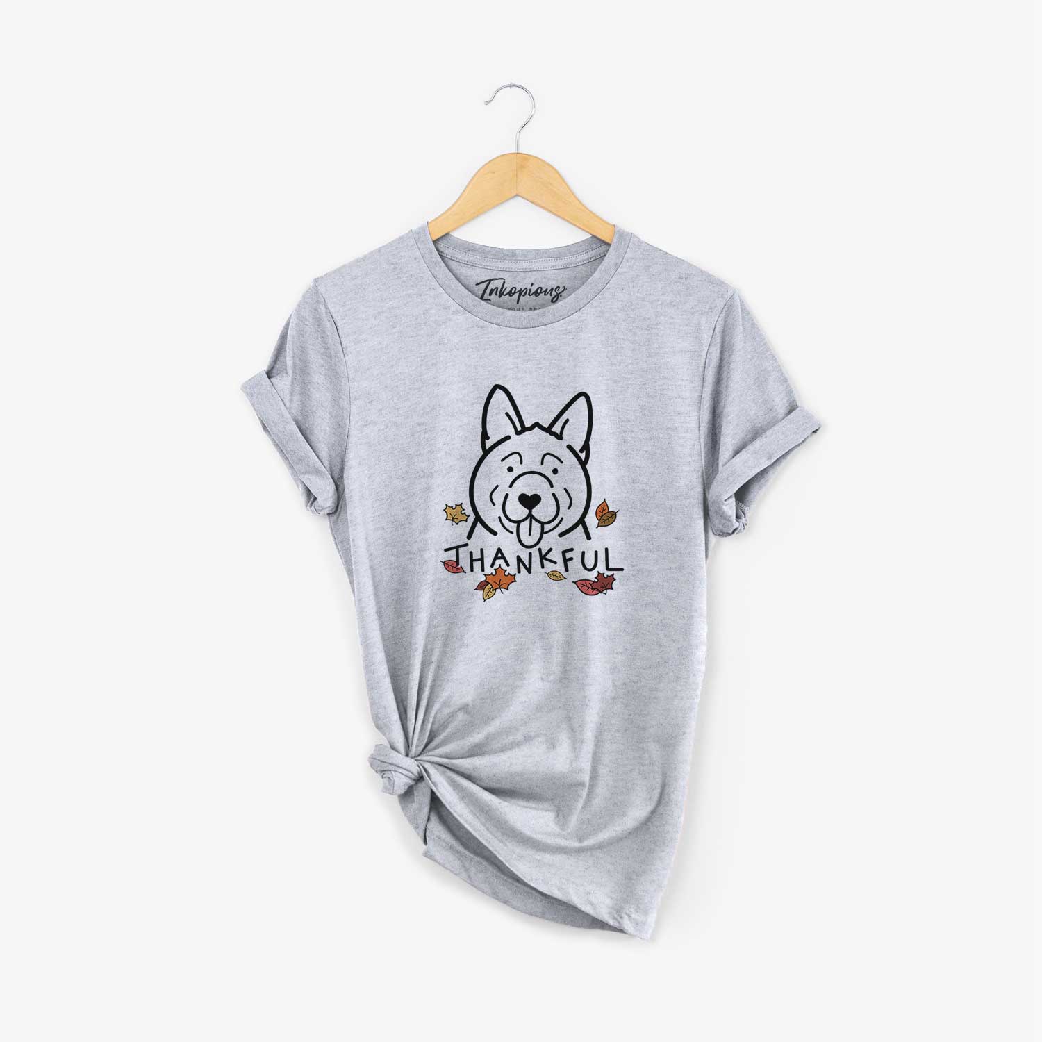Minimalist line drawing of an Akita with 'Thankful' lettering on a Grey Unisex crewneck