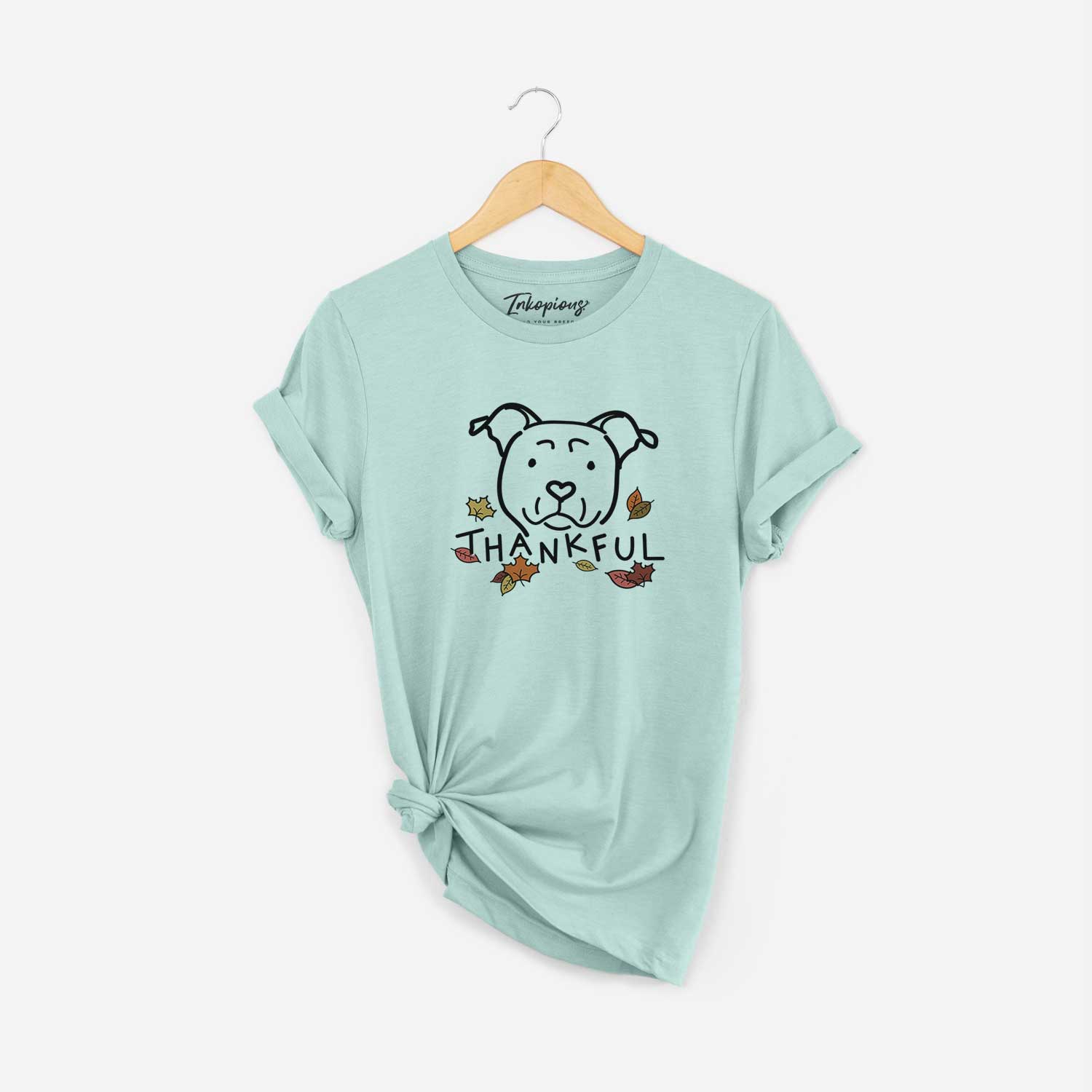 Minimalist line drawing of an American Staffordshire Terrier with 'Thankful' lettering on a Heather Sage Unisex crewneck