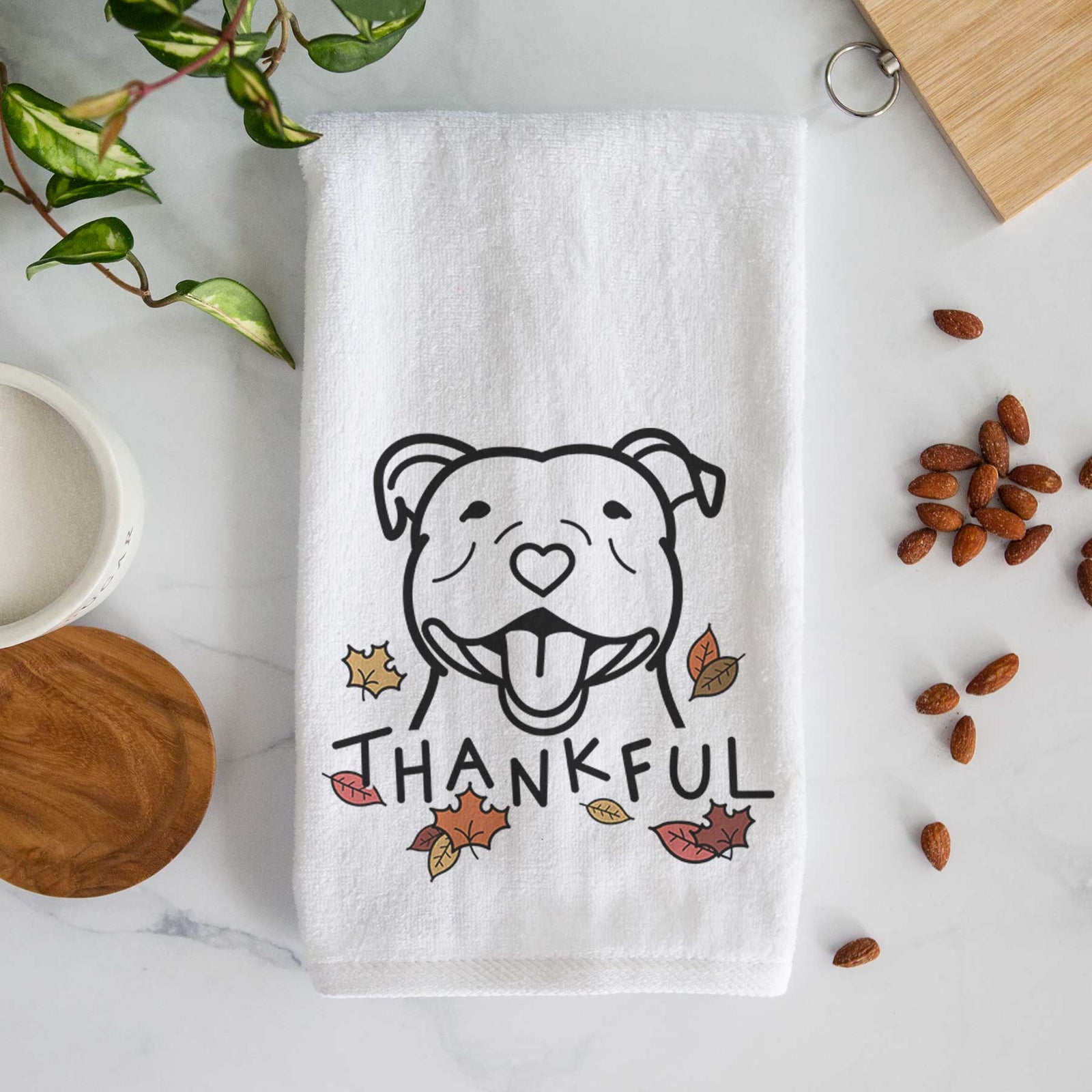 Minimalist line drawing of a Happy American Staffordshire Terrier with 'Thankful' lettering on a decorative hand towel