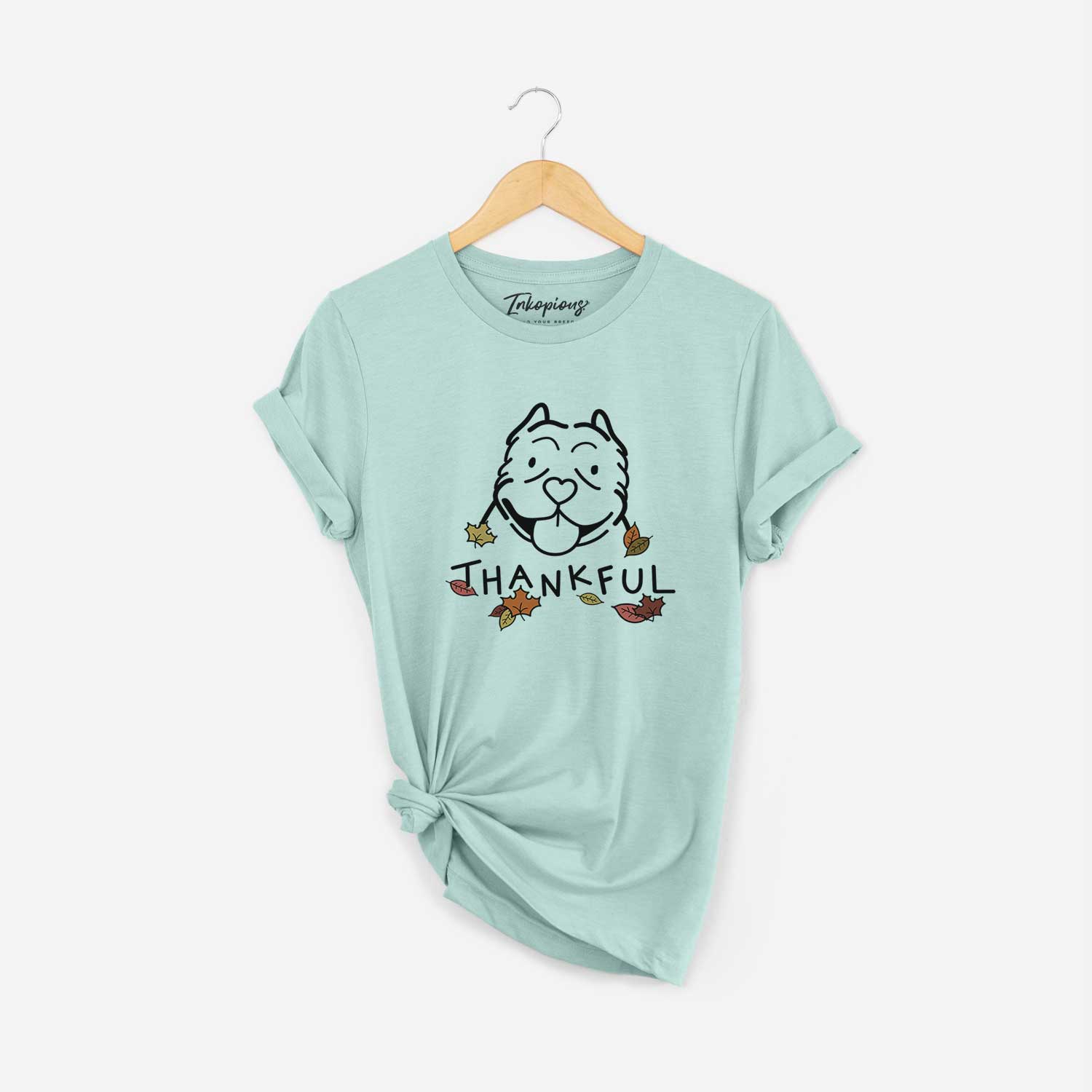 Minimalist line drawing of an American Bully with 'Thankful' lettering on a Heather Sage Unisex crewneck