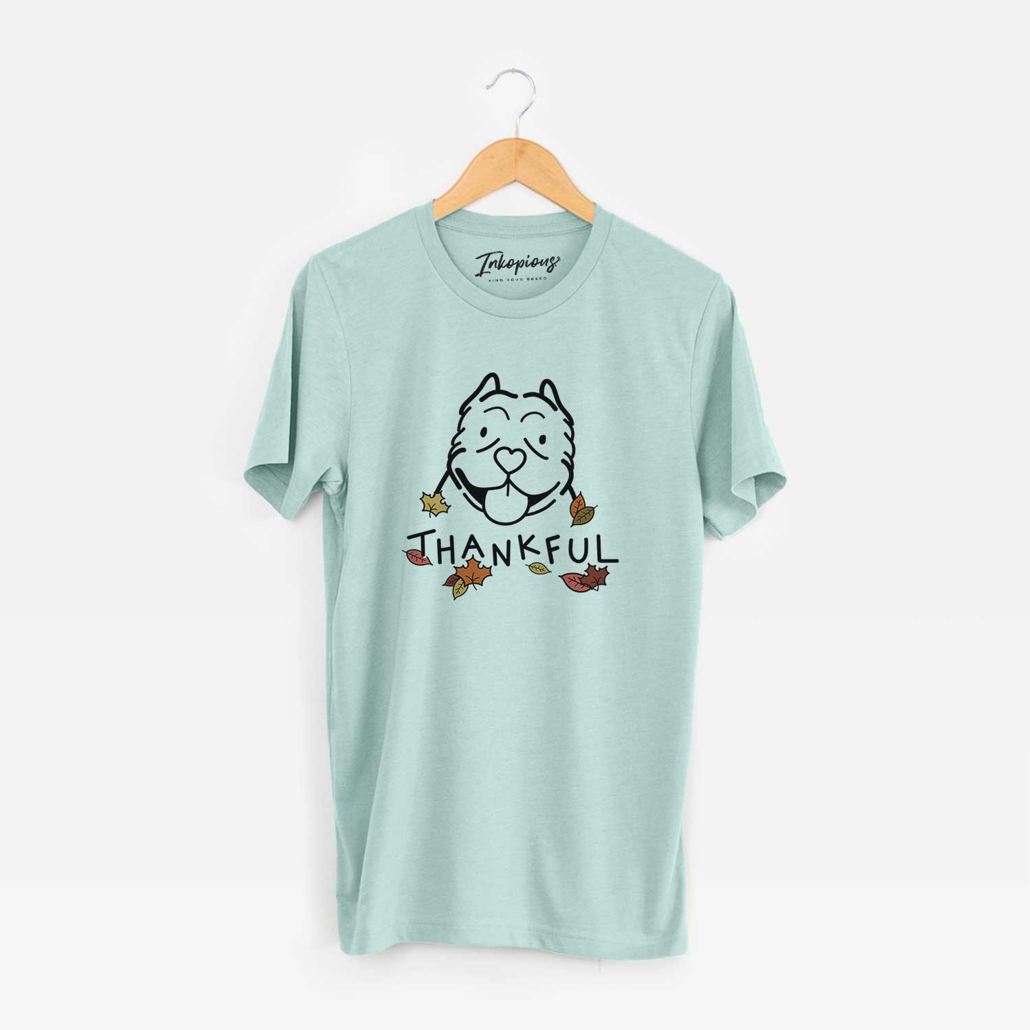 Minimalist line drawing of an American Bully with 'Thankful' lettering on a Heather Sage Unisex crewneck