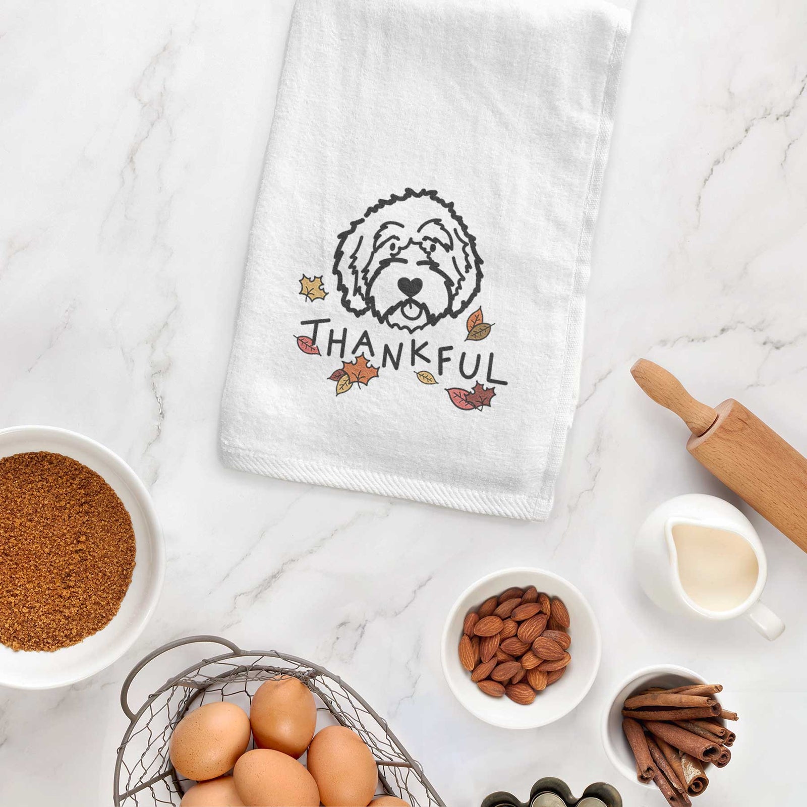 Minimalist line drawing of an Aussiedoodle with 'Thankful' lettering on a decorative hand towel