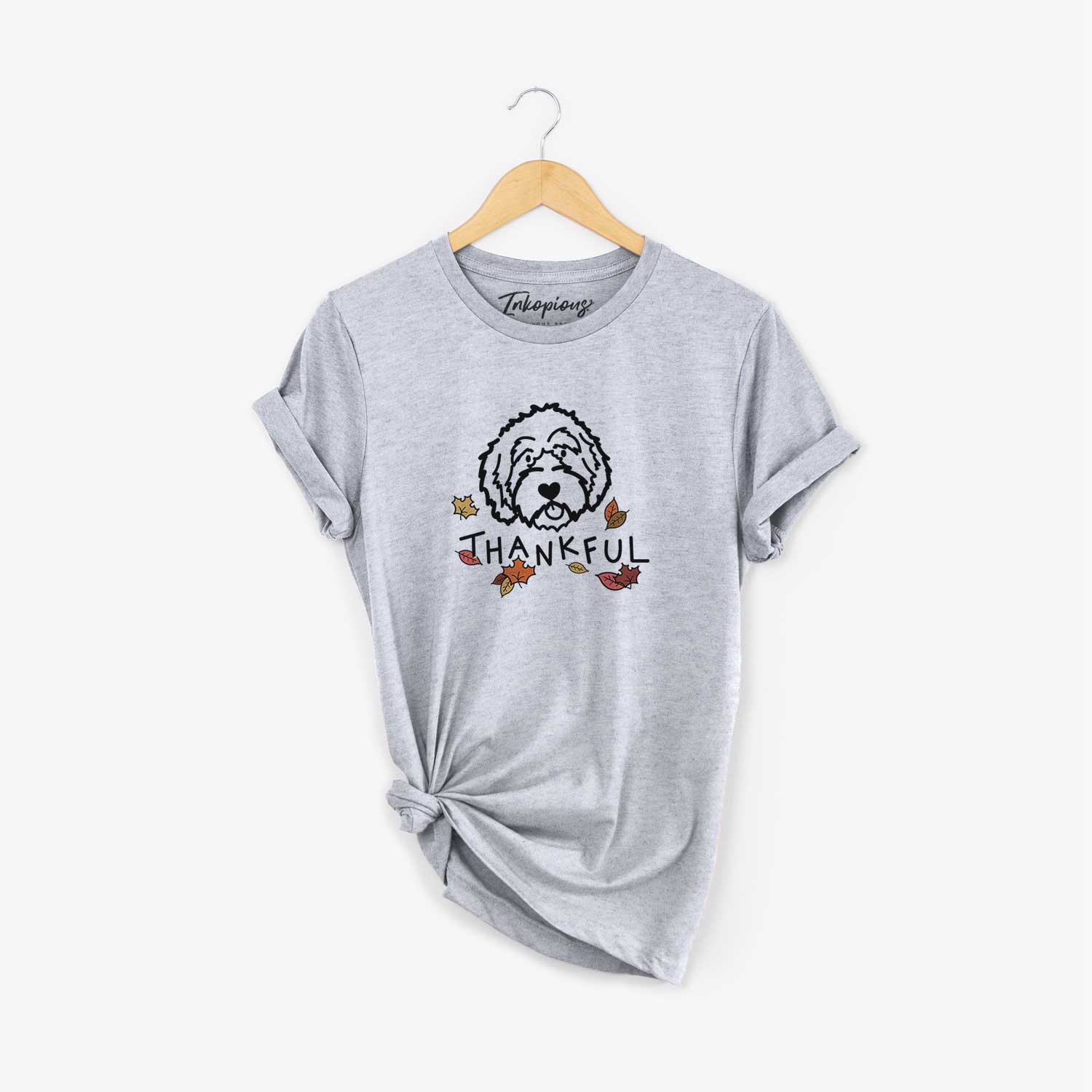 Minimalist line drawing of an Aussiedoodle with 'Thankful' lettering on a Grey Unisex crewneck