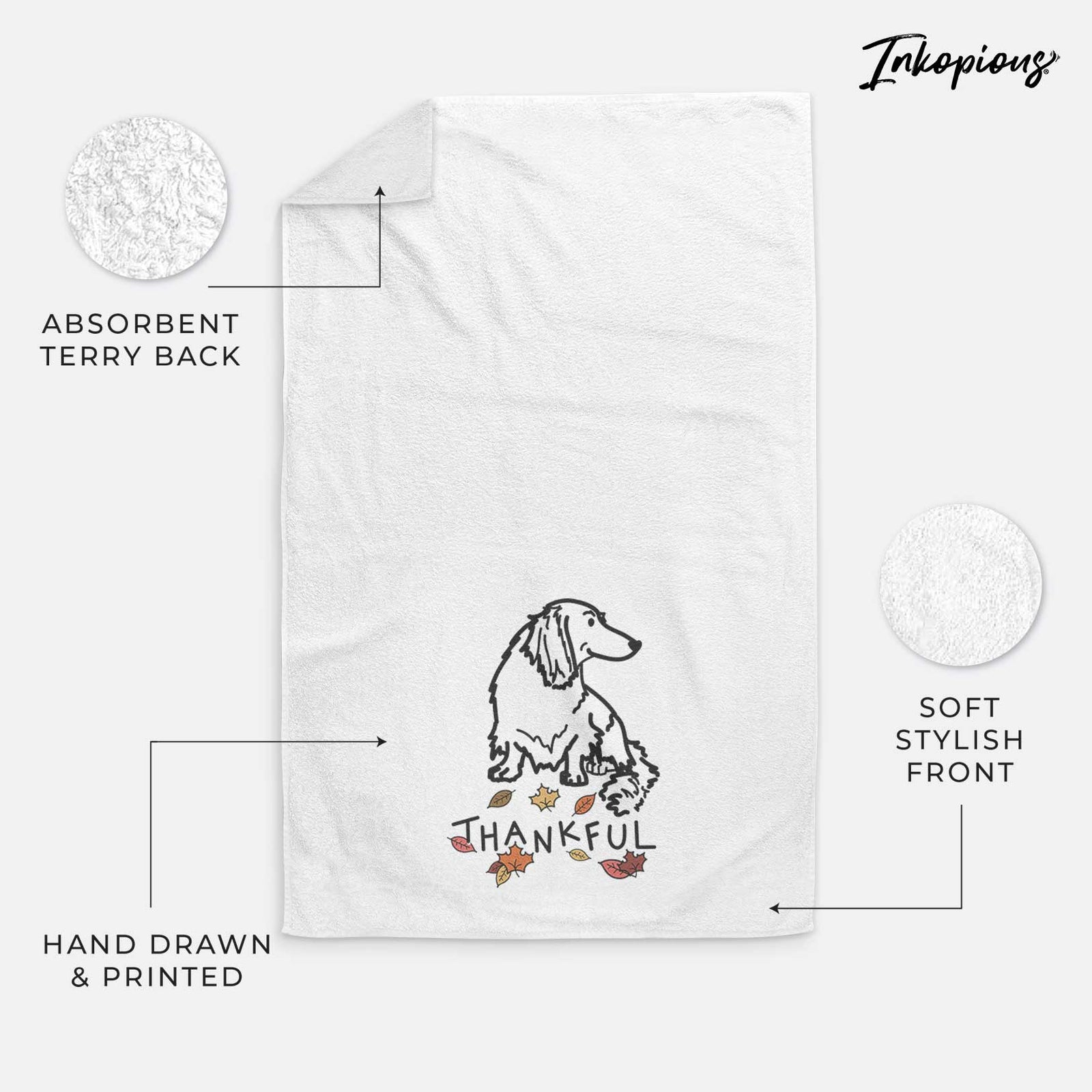 Minimalist line drawing of Bella the Dachshund with 'Thankful' lettering on a decorative hand towel