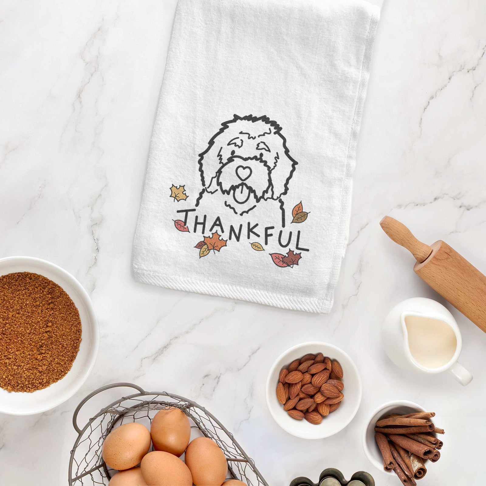 Minimalist line drawing of a Bernedoodle with 'Thankful' lettering on a decorative hand towel