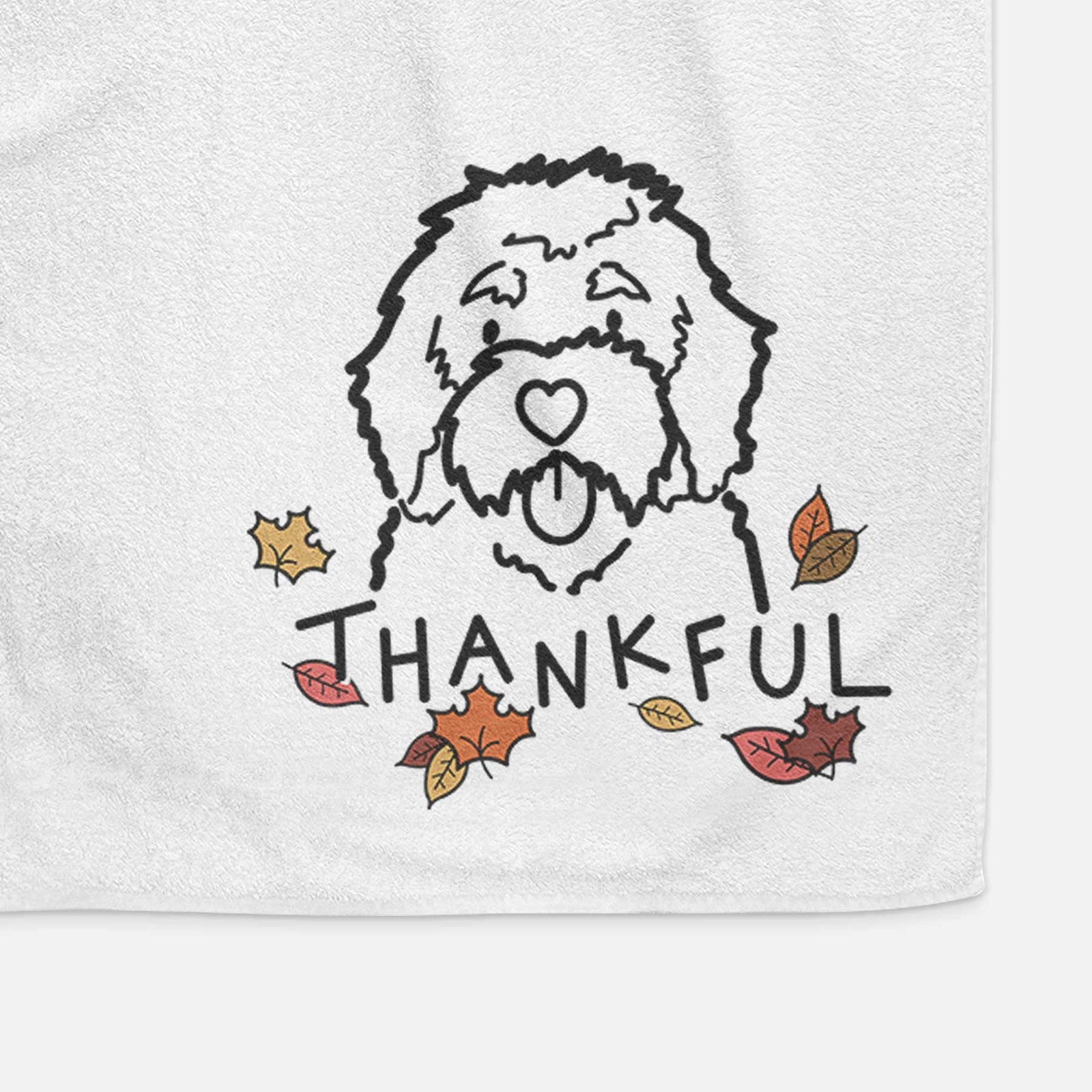 Minimalist line drawing of a Bernedoodle with 'Thankful' lettering on a decorative hand towel